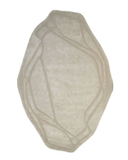 The RAMSHA HOME Handmade irregular 200x300 cm Rug HTWV-198 features a contemporary, organic design with an abstract cream and beige pattern accented by subtle, slightly raised intersecting lines. Its soft edges and unique shape make it a striking geometric area rug, perfect for modern interiors.