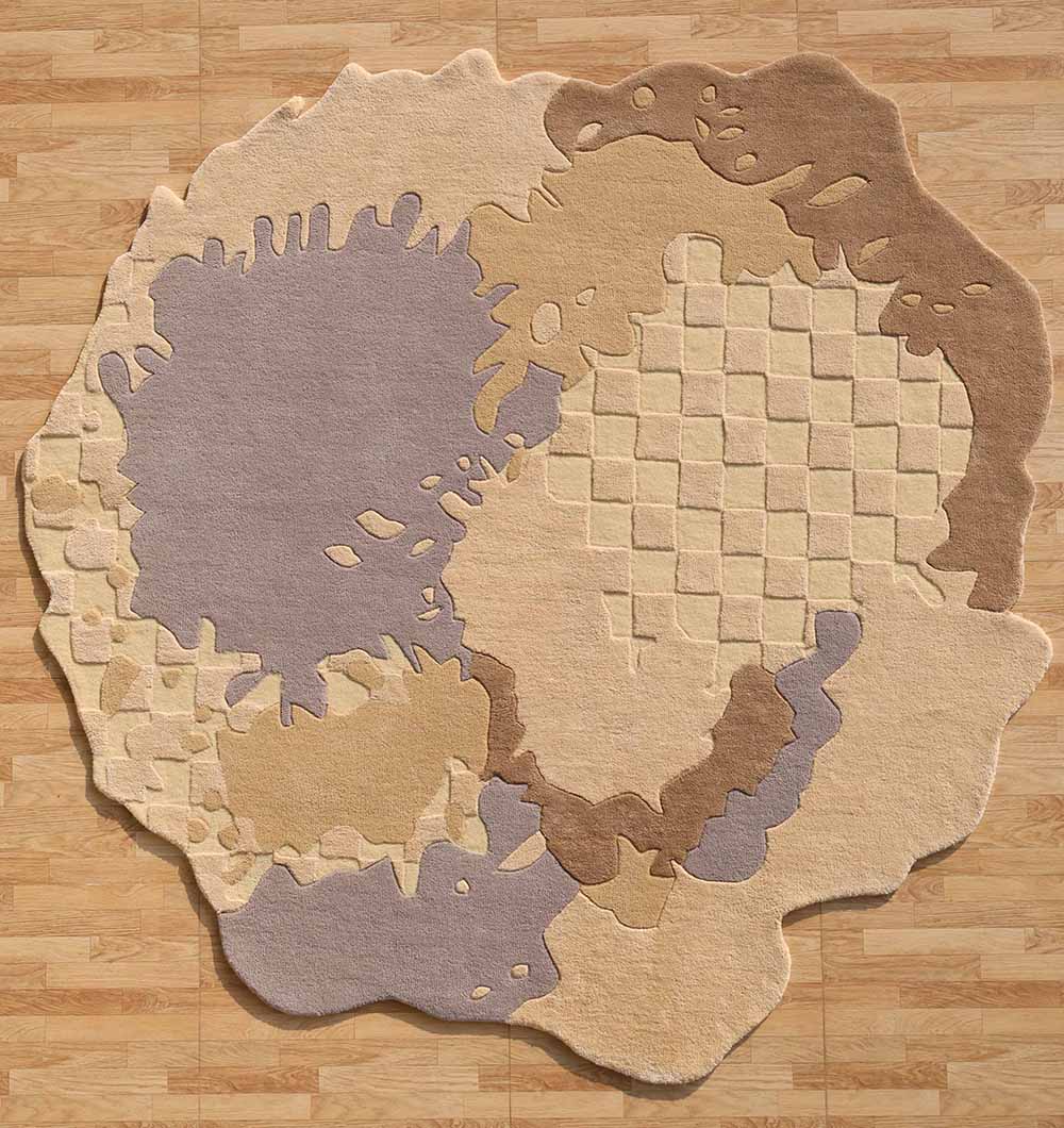 The Abstract Shaped Handmade Area Rug- HTWV 174 (200x300 cm) by RAMSHA HOME features irregular edges, splash shapes, and checkerboard texture in beige, tan, light brown, and gray—perfect as a statement piece on any light wood floor.