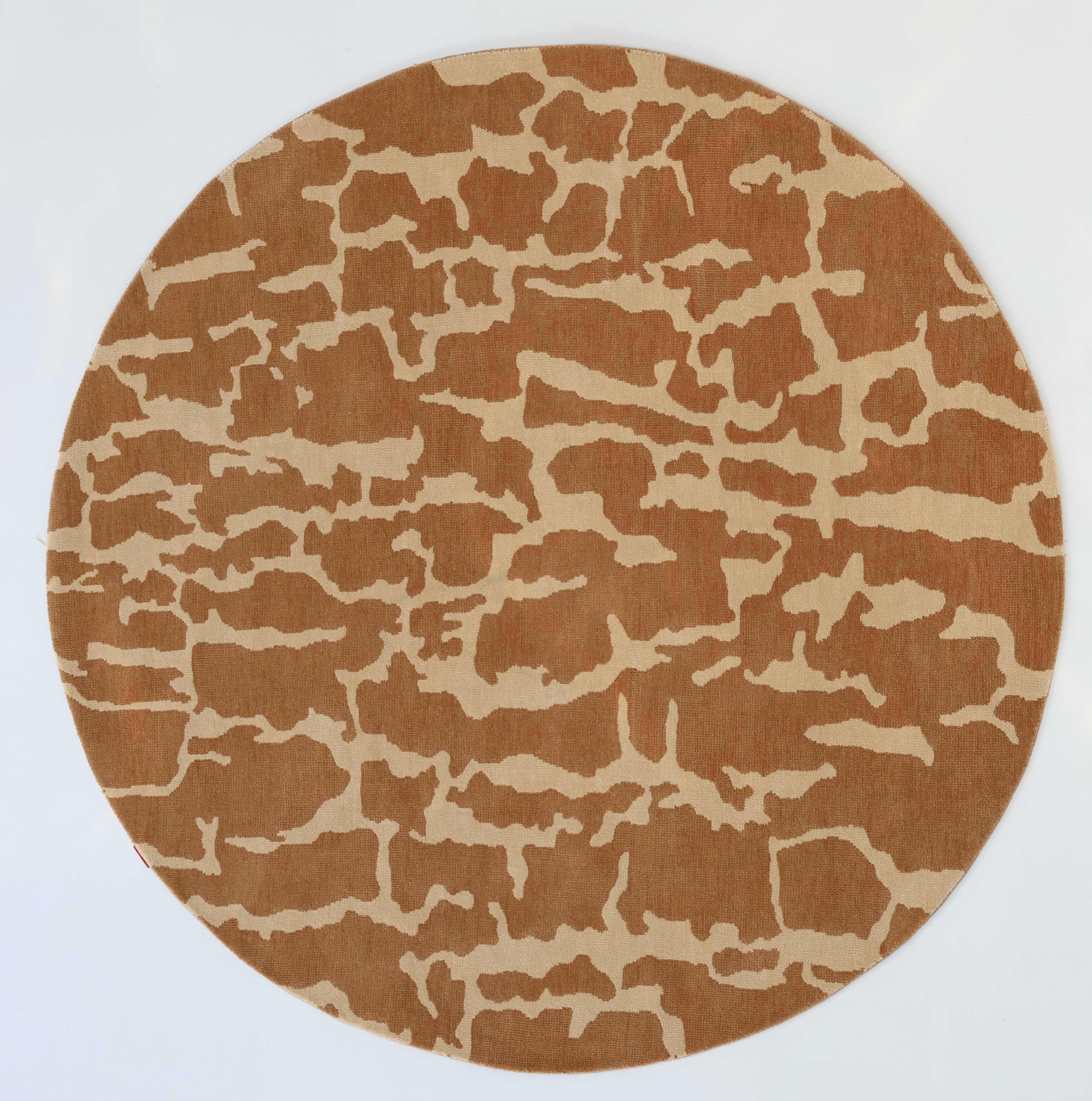 The RAMSHA HOME Natural Drift Round Area Rug (Shaped Rug CMN 116) features a modern light brown and beige abstract design with organic, crack-like patterns on a round shape, displayed against a white background.