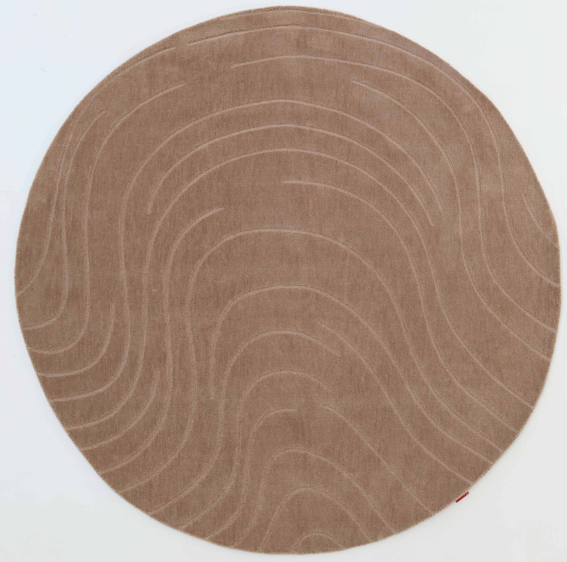 The RAMSHA HOME Modern Brown Round Abstract Rug CMN 124 features subtle wavy geometric patterns reminiscent of topographic contours, shown against a white background.