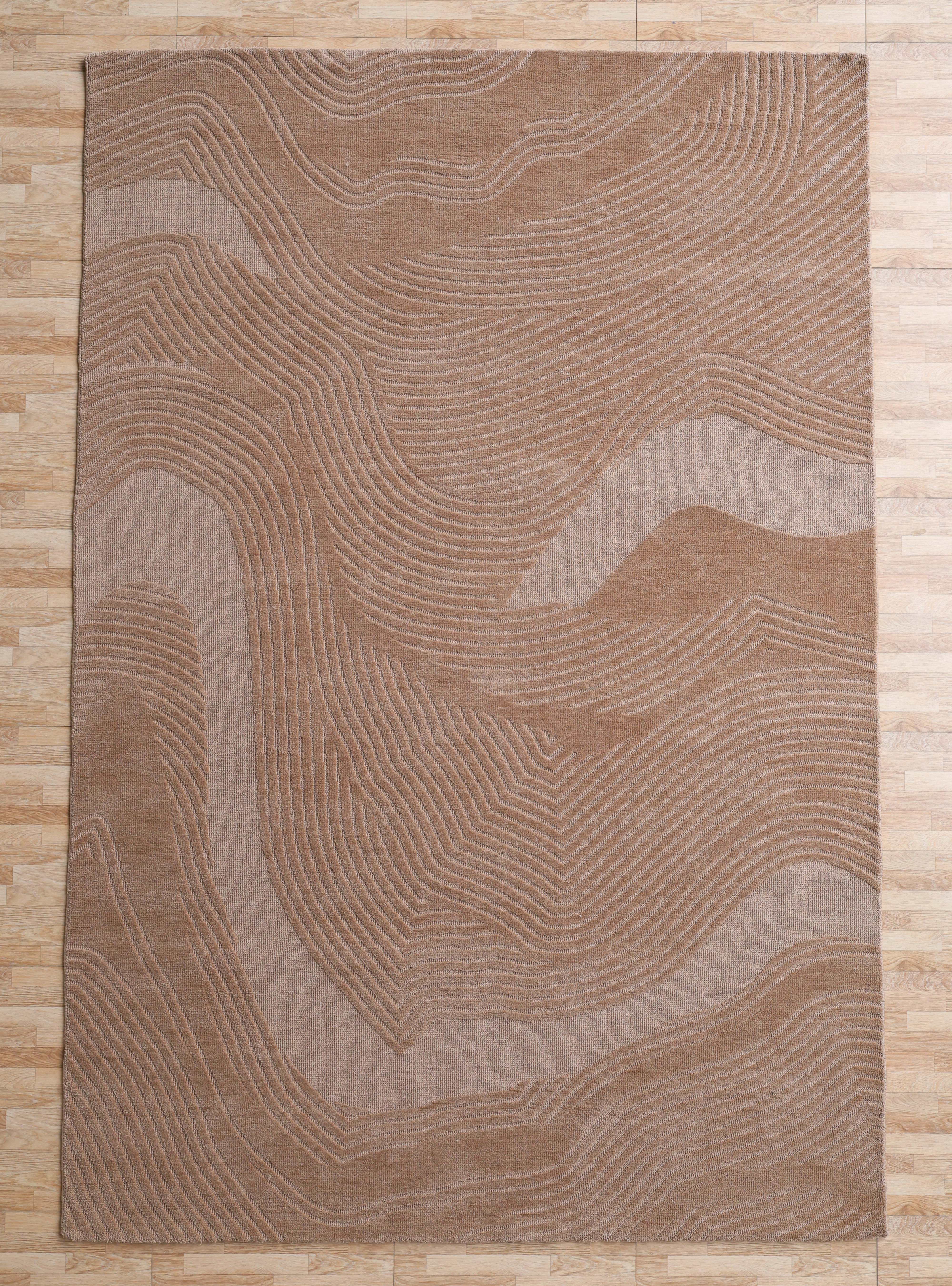 The RAMSHA HOME Terrain Design 200x300 CM Rectangle Shaped Rug CMN 112 features beige and tan abstract, wavy topographic line patterns and is pictured on a light wood floor.