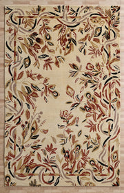 The RAMSHA HOME Vintage Floral Elegance Handmade Rug 200x300 CM -CMN 111 features a cream base with an abstract floral pattern in brown, red, tan, and black plus a wavy vine-like border. It is shown resting on a light wood floor.