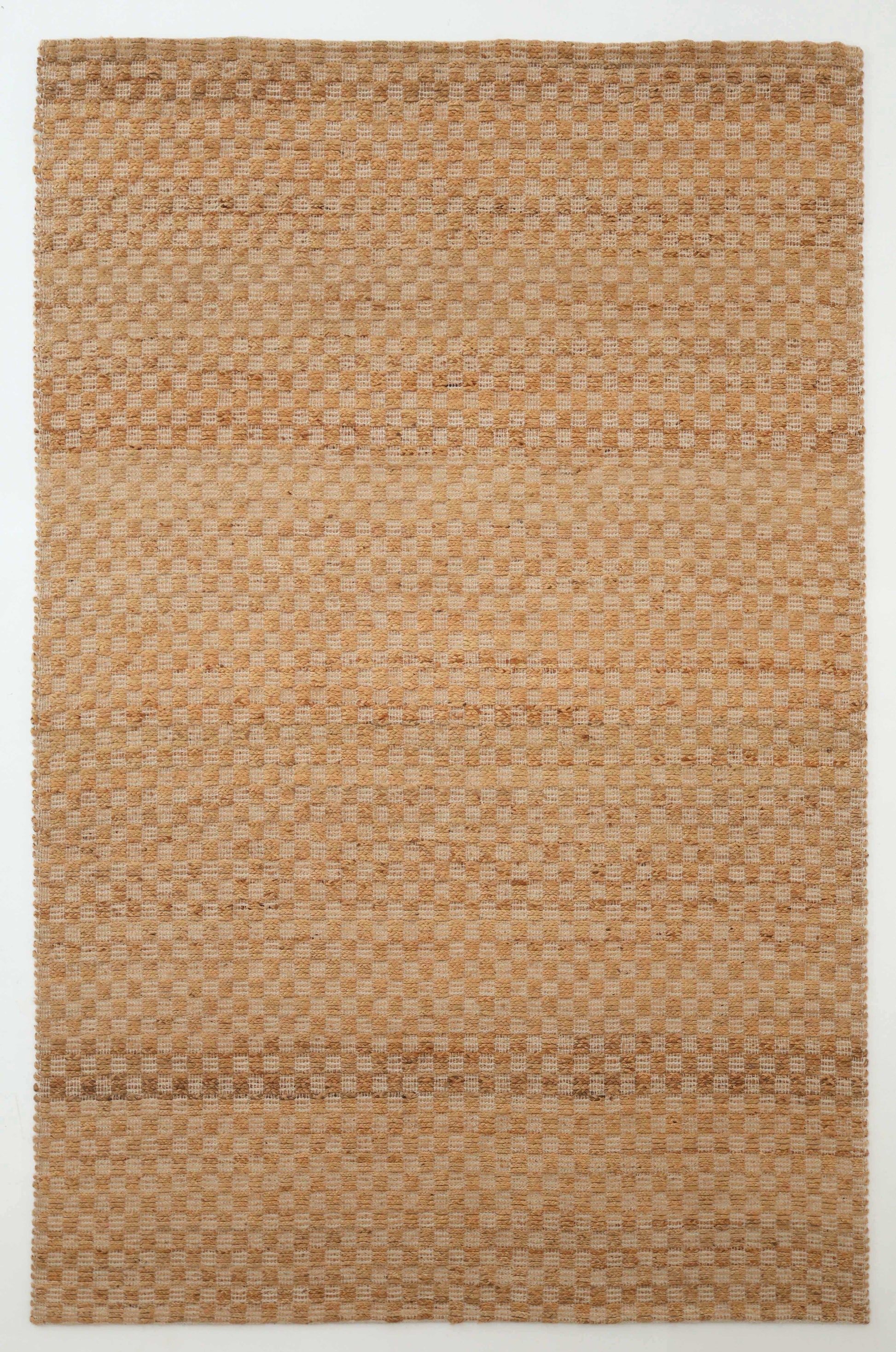 The RAMSHA HOME Handmade Natural Color Hand Woven Area Rug SR-065 features a beige and light brown checkered design, adding artisanal charm to any space. Displayed on a white background, it’s perfect for unique home décor.