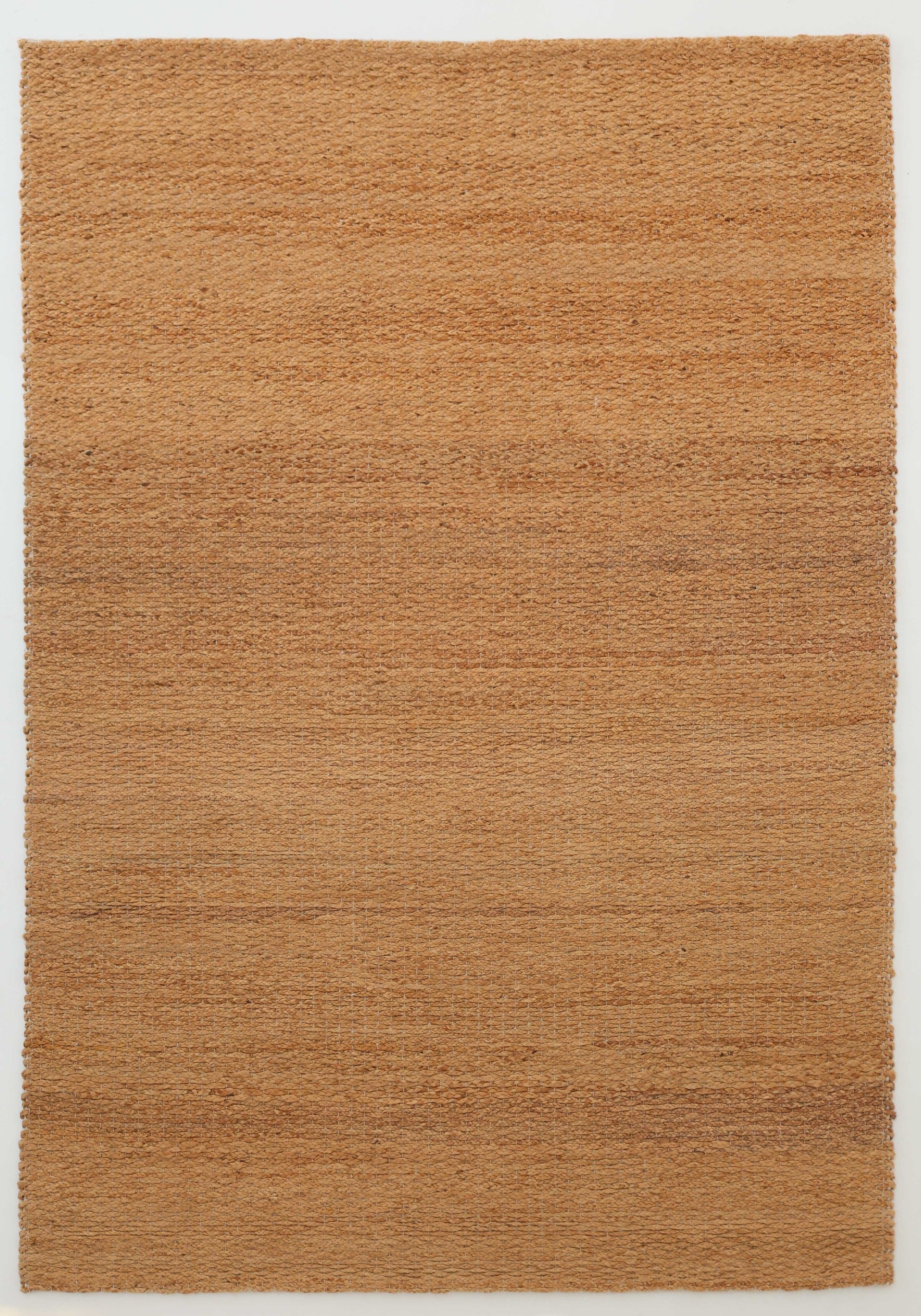 The RAMSHA HOME Handmade Natural Color Hand Woven Area Rug SR-063 features rectangular, natural tan and light brown jute fibers with subtle color and texture variations, ideal for artisanal home décor. Displayed on a white background.