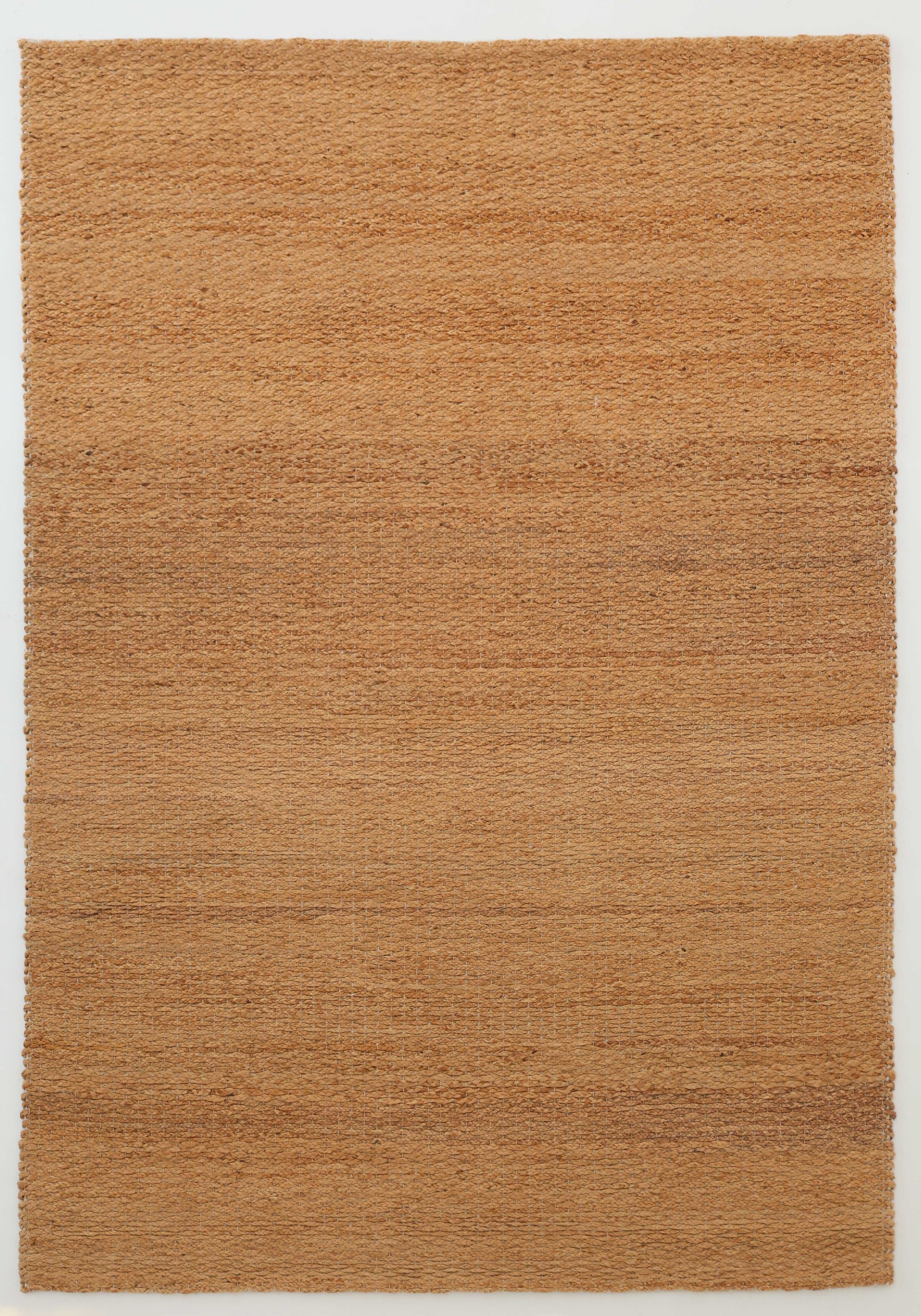 The RAMSHA HOME Handmade Natural Color Hand Woven Area Rug SR-063 features rectangular, natural tan and light brown jute fibers with subtle color and texture variations, ideal for artisanal home décor. Displayed on a white background.
