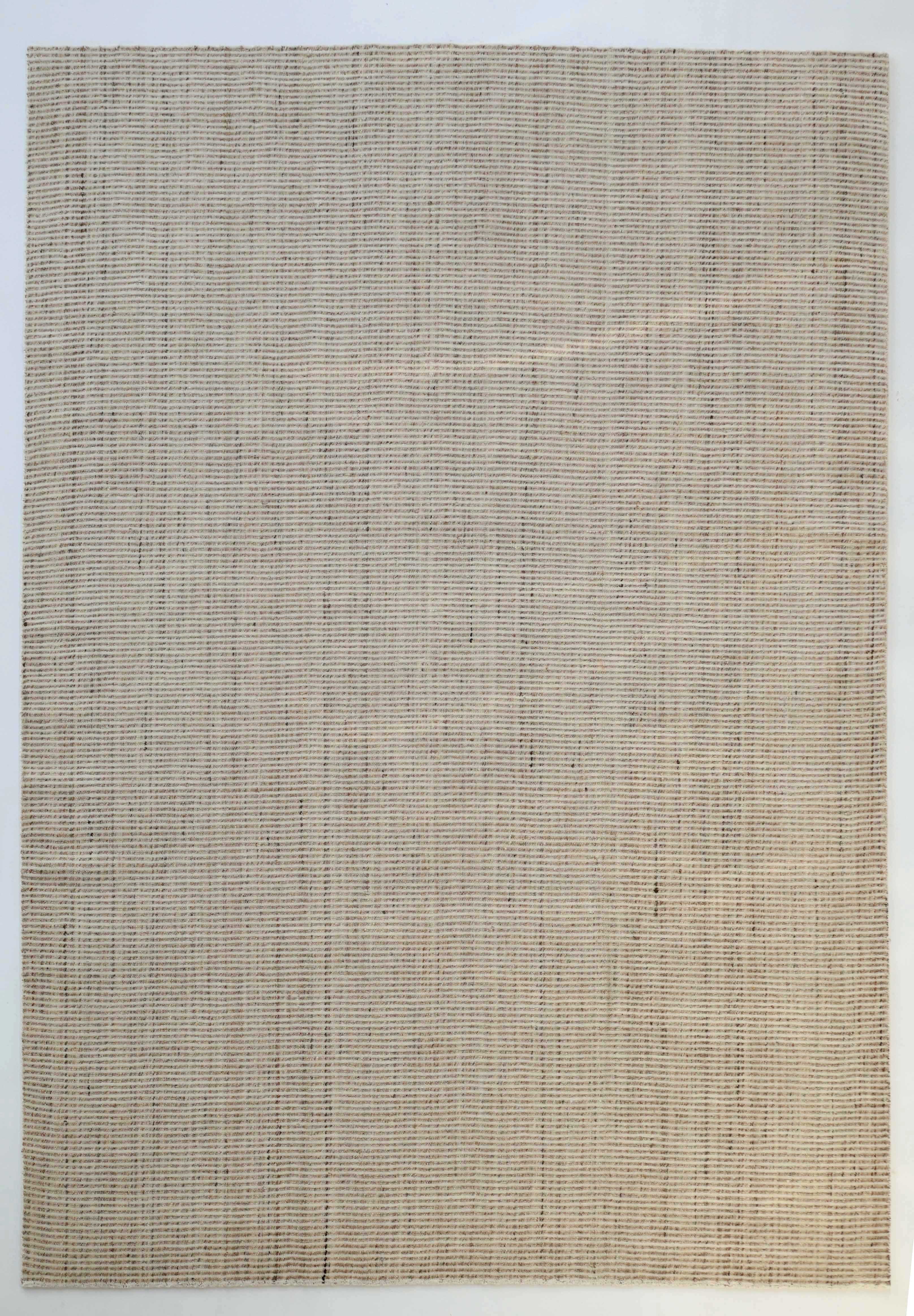 The RAMSHA HOME Handwoven Ivory Wool Rug (HLR-001) is a rectangular, minimalist area rug in natural cream with a subtle textured pattern and no visible designs or borders, offering a handwoven, natural look.