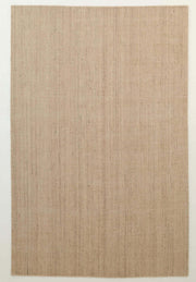 The Handmade Natural Wool Rug – Textured Beige Area Rug (HLR-002) by RAMSHA HOME features a minimalist rectangular design in beige, handwoven with natural fibers, and is shown on a plain light-colored floor.