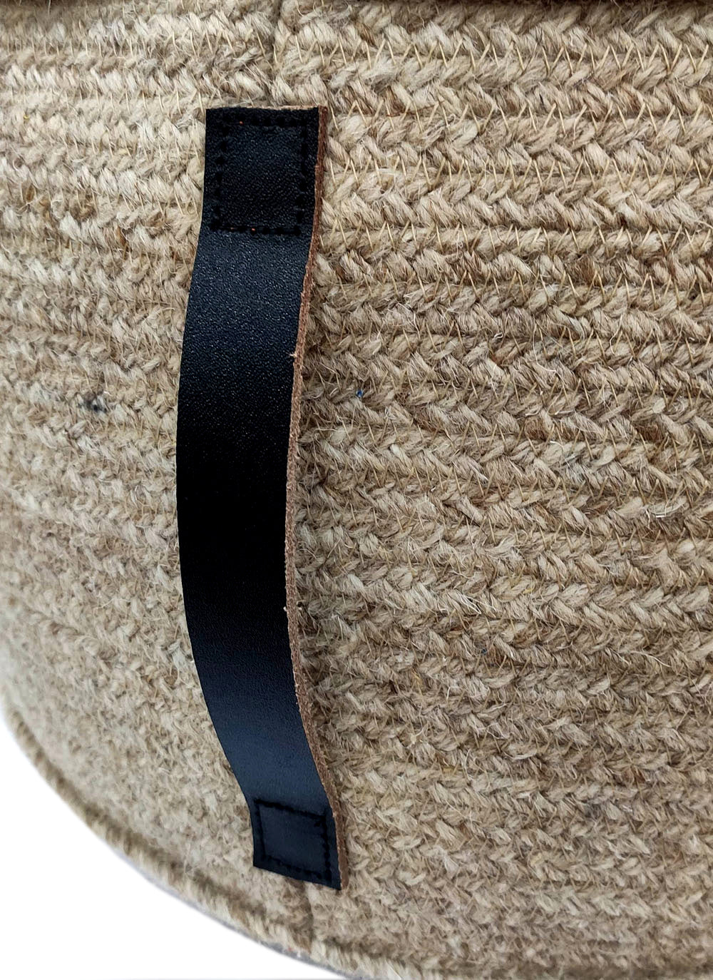 Close-up of RAMSHA HOME’s Natural Wool Pouf With Leather Handle PF-052, featuring textured natural fiber weaving and a stitched black leather handle—an inviting accent for your living space.