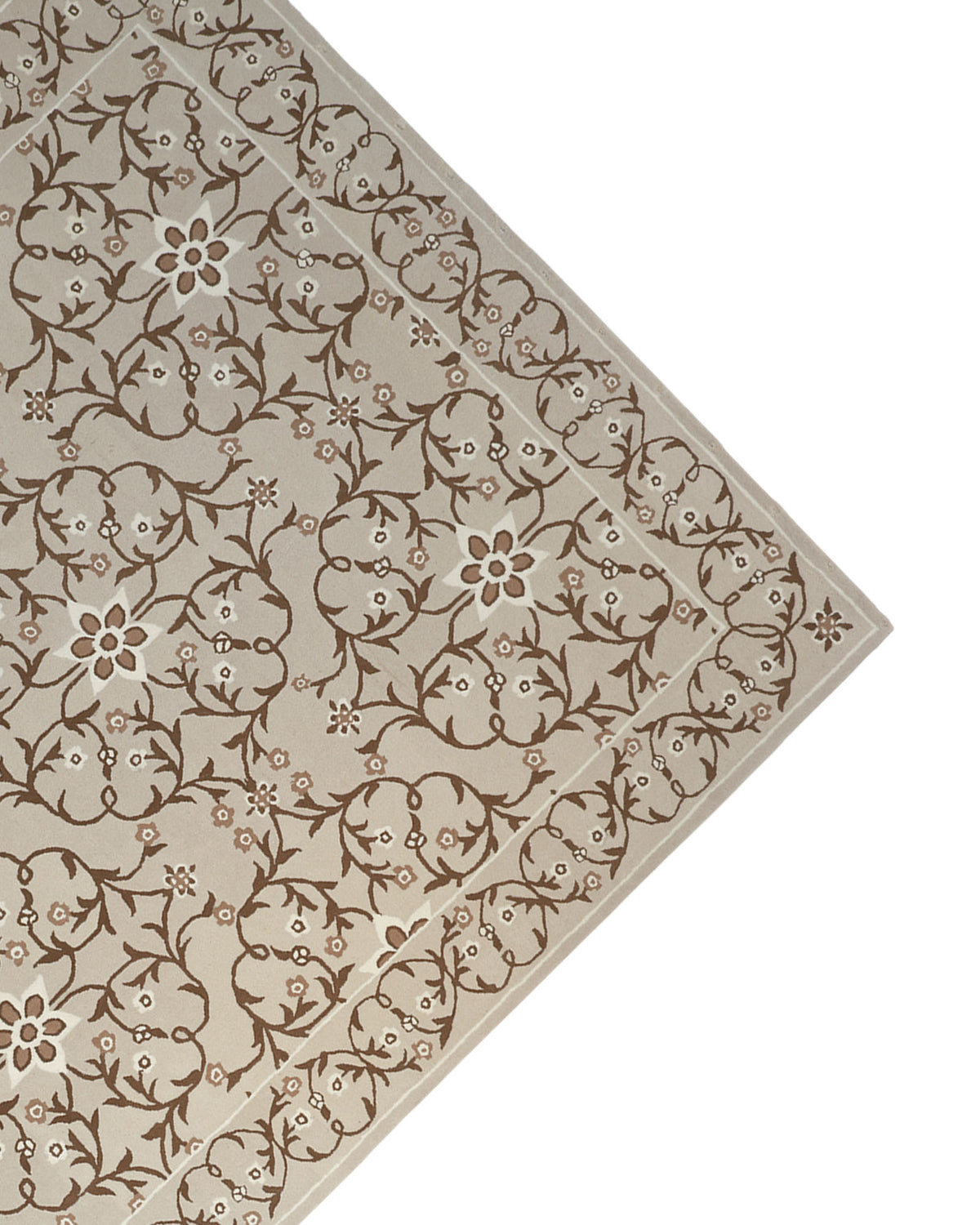 An Exquisite Multi Color Decor Handmade Rug - HTW 99 (300x400 CM) from RAMSHA HOME, featuring a beige hand-tufted wool construction with a brown floral and vine pattern, is displayed diagonally with only a corner visible against a white background.