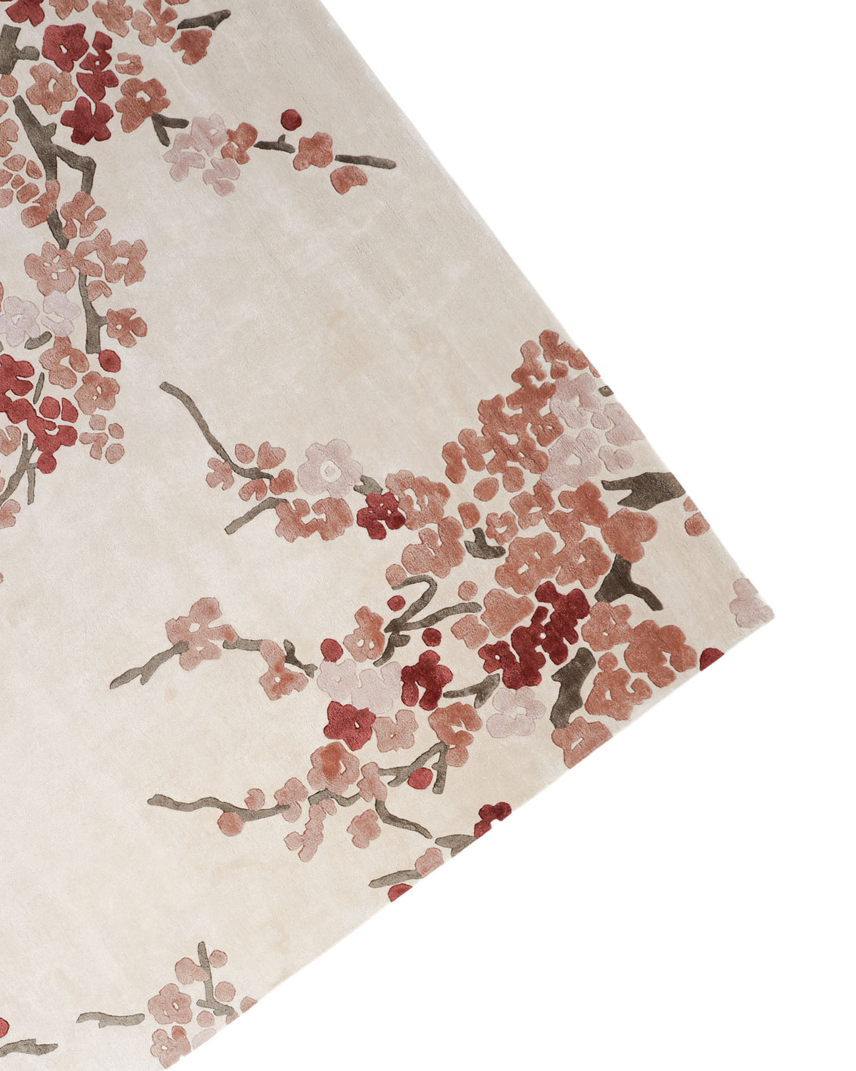The RAMSHA HOME Floral Blossom Area Rug in Beige, Pink & Terracotta (300x400 CM – HTV-30) showcases a cream-colored base with a botanical design of pink and red blossoms and greenish-brown branches, displayed at an angle.