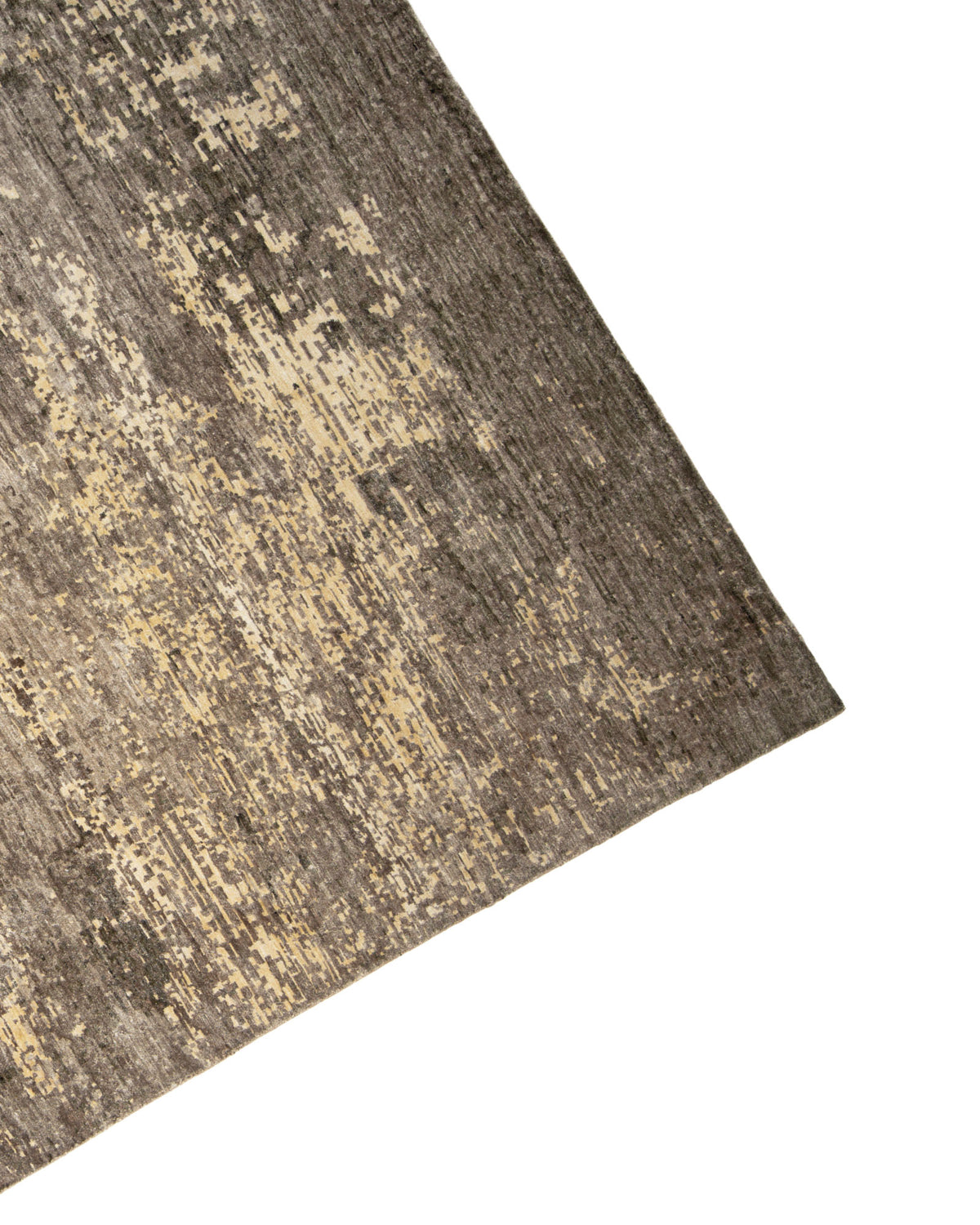 A close-up of the corner of the RAMSHA HOME Hand Knotted Living Room Rug - HKWB-013, showcasing its textured bamboo silk and abstract pattern in shades of brown, beige, and gray on a white background.