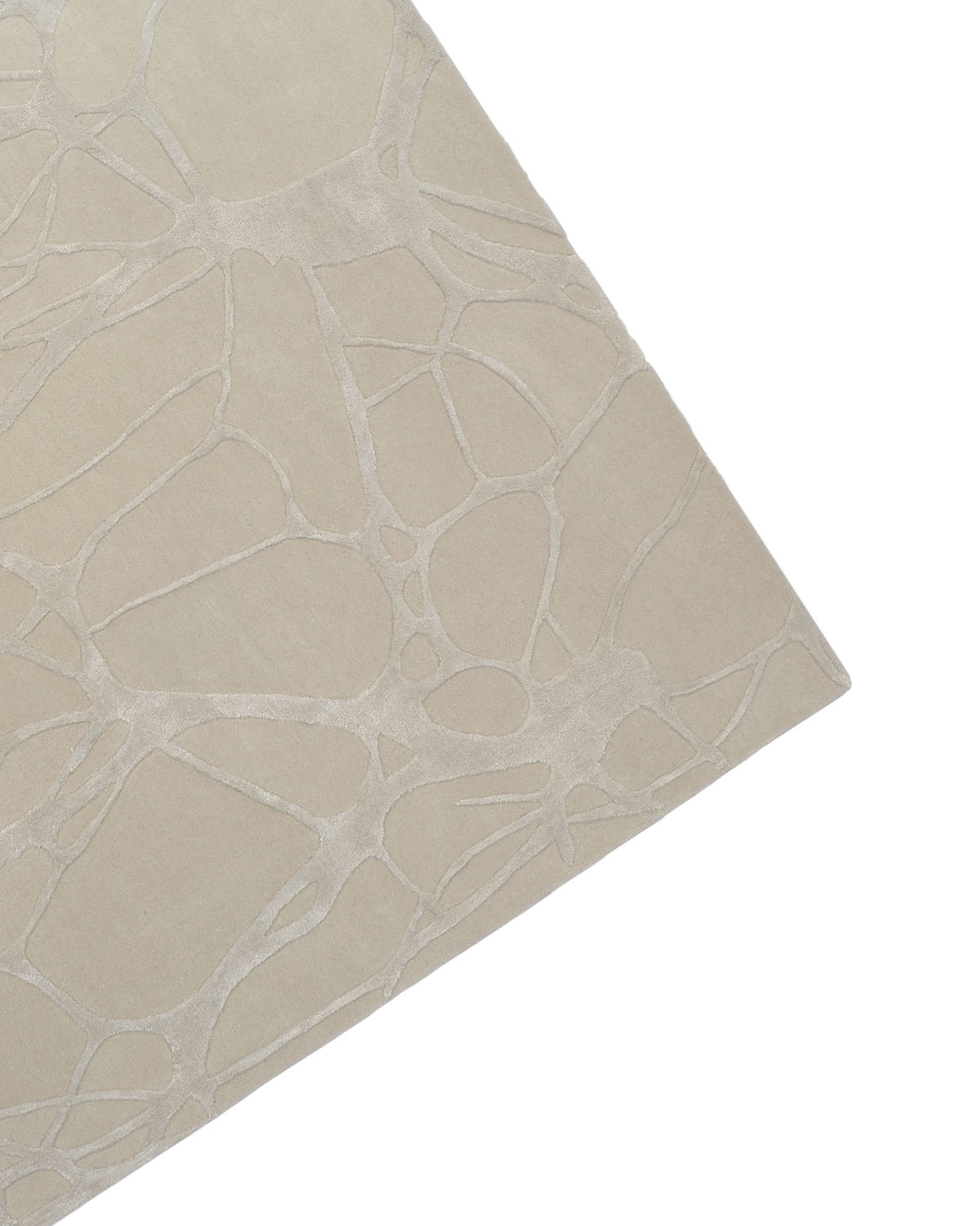 Corner of the RAMSHA HOME Natural White Color Handmade Area Rug - HTWV-145 (200x300 cm), showcasing an interconnected, hand-tufted wool pattern with subtly raised lines. This modern area rug features organic, web-like shapes in a soft, neutral palette.