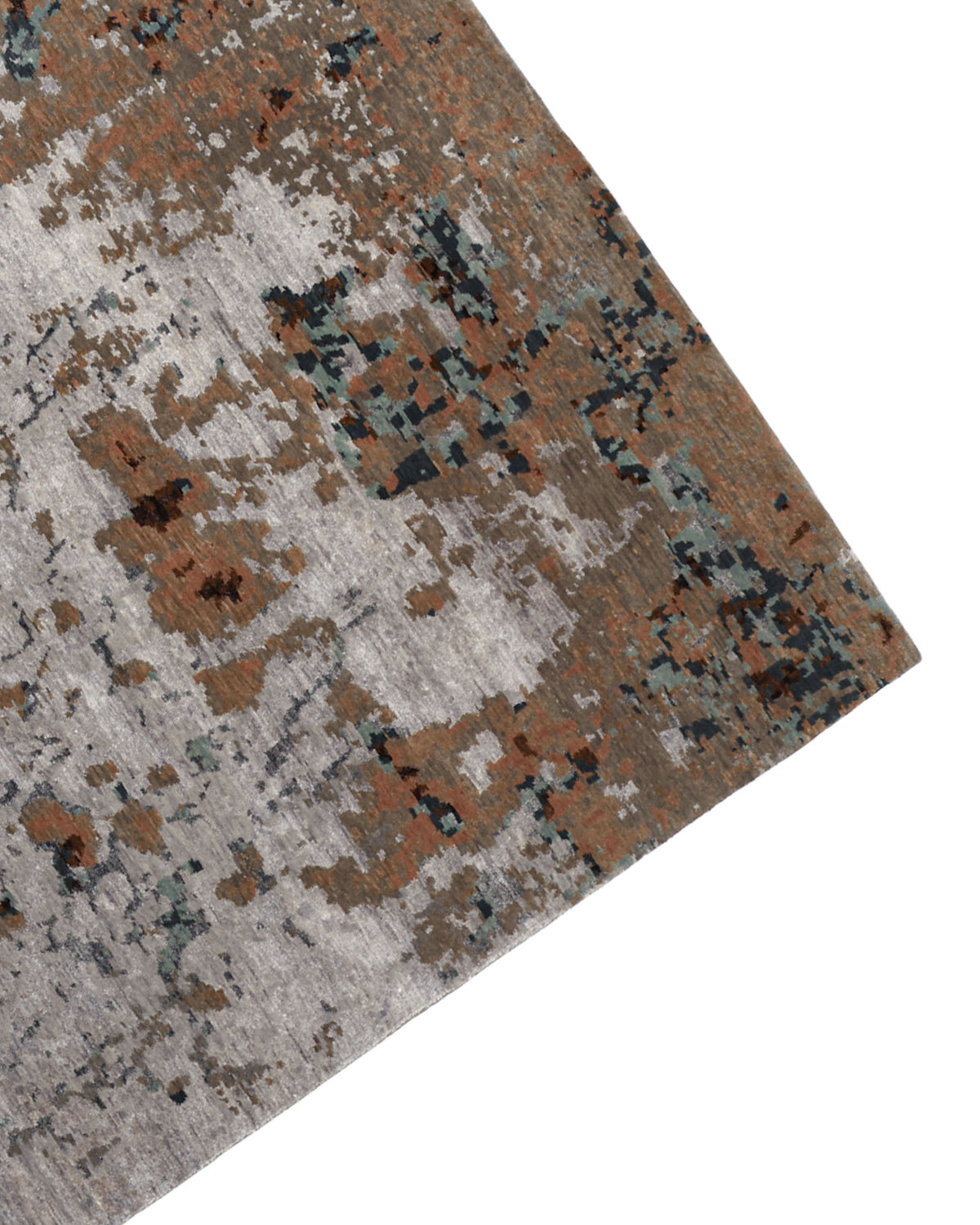 A close-up of the RAMSHA HOME Bamboo Silk & Cotton Hand Knotted Carpet HKWB-012 showcases its textured, painterly abstract pattern in gray, brown, blue, and black tones. The hand knotted design resembles the luxurious look and feel of bamboo silk.