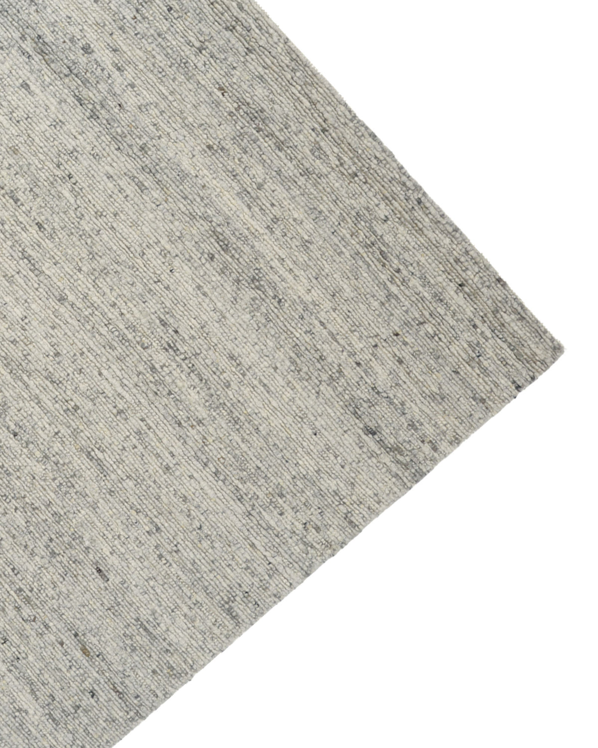 Close-up view of the RAMSHA HOME Soft Terra Flatweave Wool Rug (SRN-043) in light gray, featuring subtle speckles and displayed at an angle against a white background to showcase its traditional craftsmanship and versatile neutral color palette.