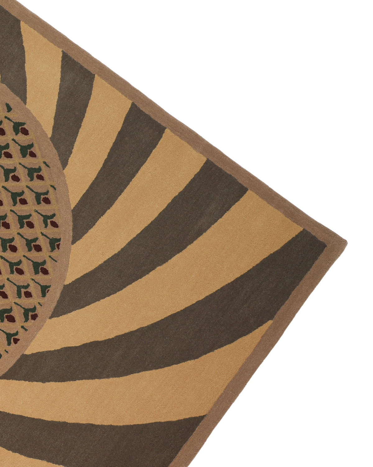 A corner of the Modern Mustard & Grey Wool Carpet HTW-30 by RAMSHA HOME displays tan and dark brown radial stripes, with a circular section highlighted by a tan pattern and small accents in green, red, and black. This hand-tufted rug is expertly crafted from premium New Zealand wool for lasting quality and comfort.