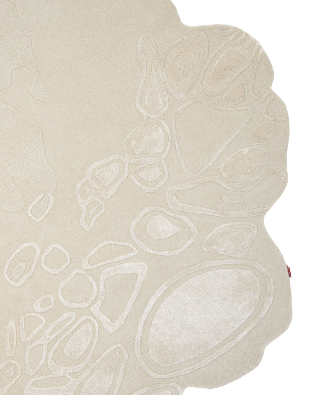 The Modern Sculptural Shape Rug Neutral Beige 200 cm – HTWV 207 by RAMSHA HOME features an irregular sculptural design with raised geometric patterns reminiscent of puddles or stones, displayed against a white background—a distinctive beige area rug ideal for bringing artistic flair to any neutral space.