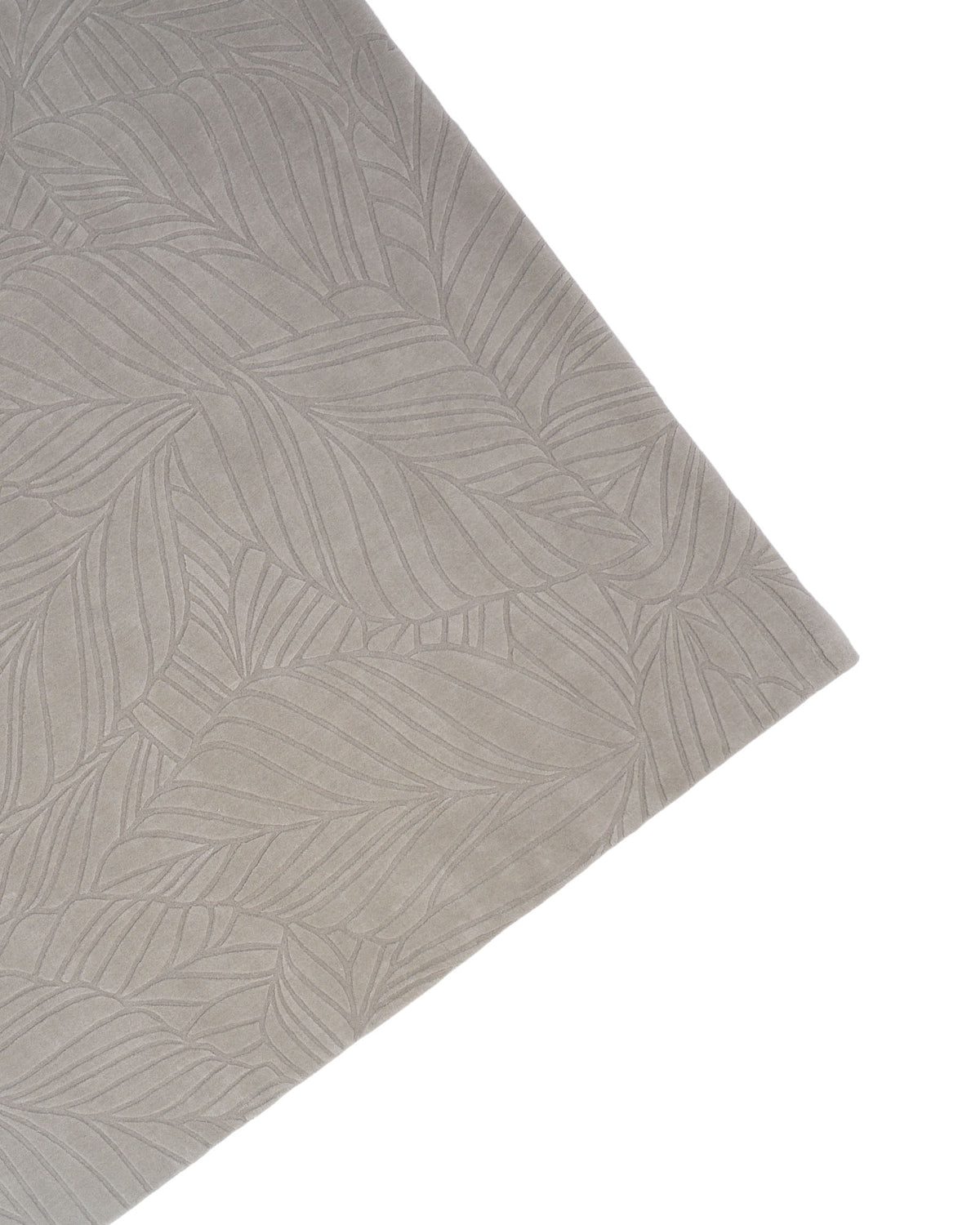 A close-up of the RAMSHA HOME Rectangle Handmade Decorative Grey Color Area Rug - LKH-030, featuring a sophisticated light gray leaf pattern in a loom-knotted wool construction with a subtle embossed design, displayed diagonally against a white background.