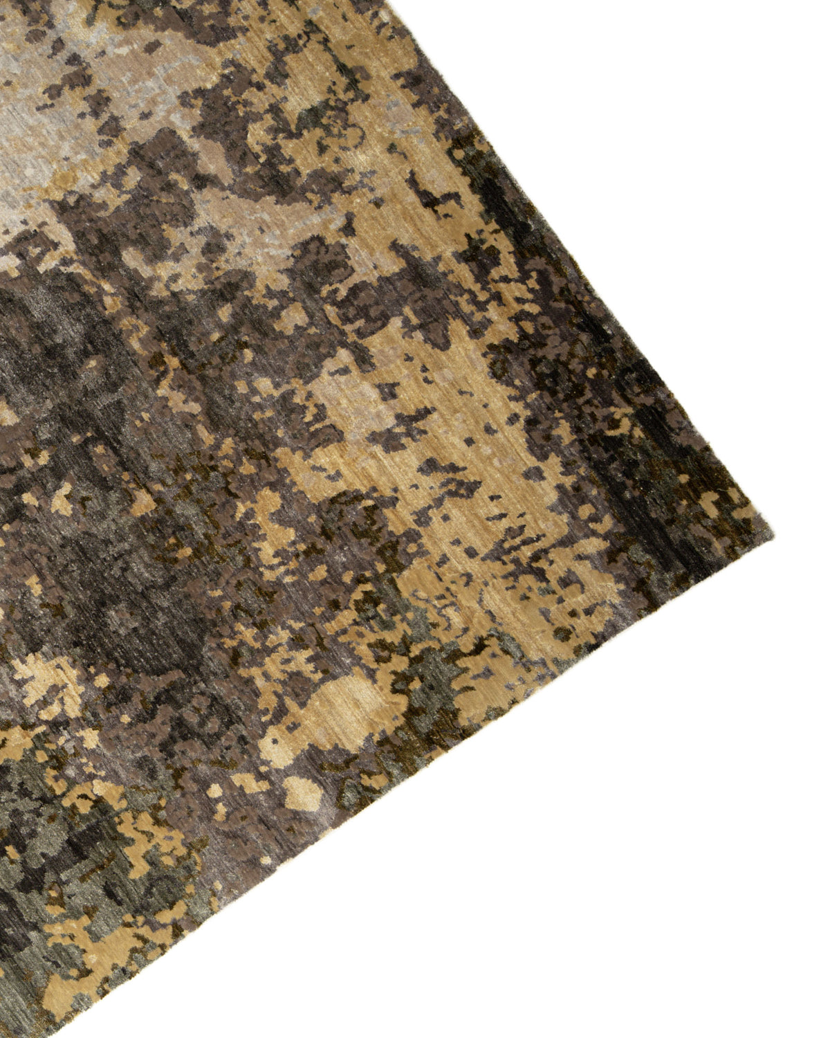 A close-up view of the RAMSHA HOME Bamboo Silk & Cotton Carpet HKWB-014, a hand knotted rug featuring an abstract mottled pattern in shades of brown, beige, and gray, displayed at an angle on a white background.