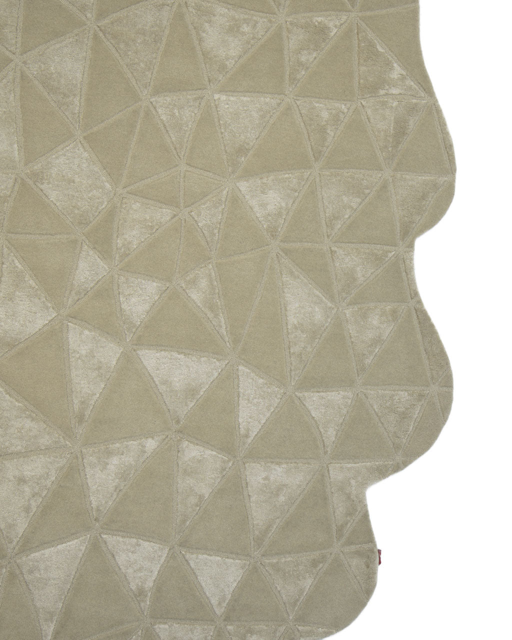 The Handmade Decor Multi Color Rug HTWV-94 by RAMSHA HOME features a beige base with geometric, triangular patterns in a range of shades and an irregular wavy edge, creating a textured, faceted look.
