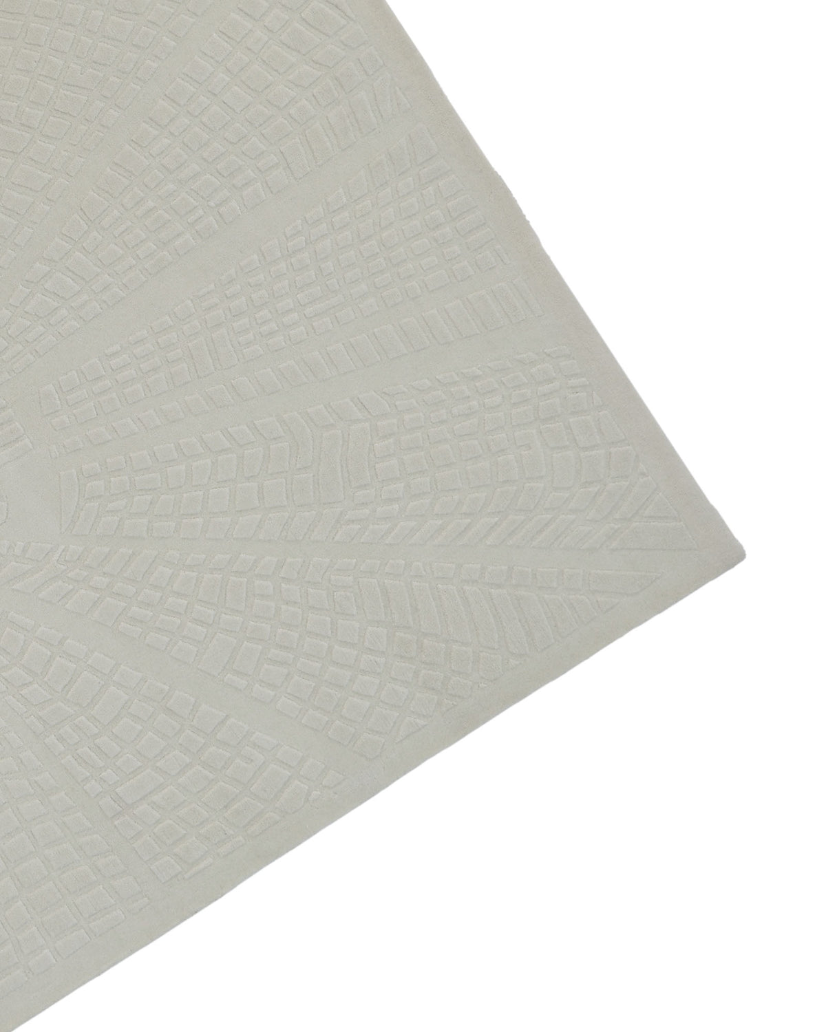A close-up of the RAMSHA HOME Handmade Decorative Area Rug - LKH-019 (200x300 cm) displays its textured wool surface in an ivory hue, featuring a geometric sunburst pattern and positioned at an angle on a white background.