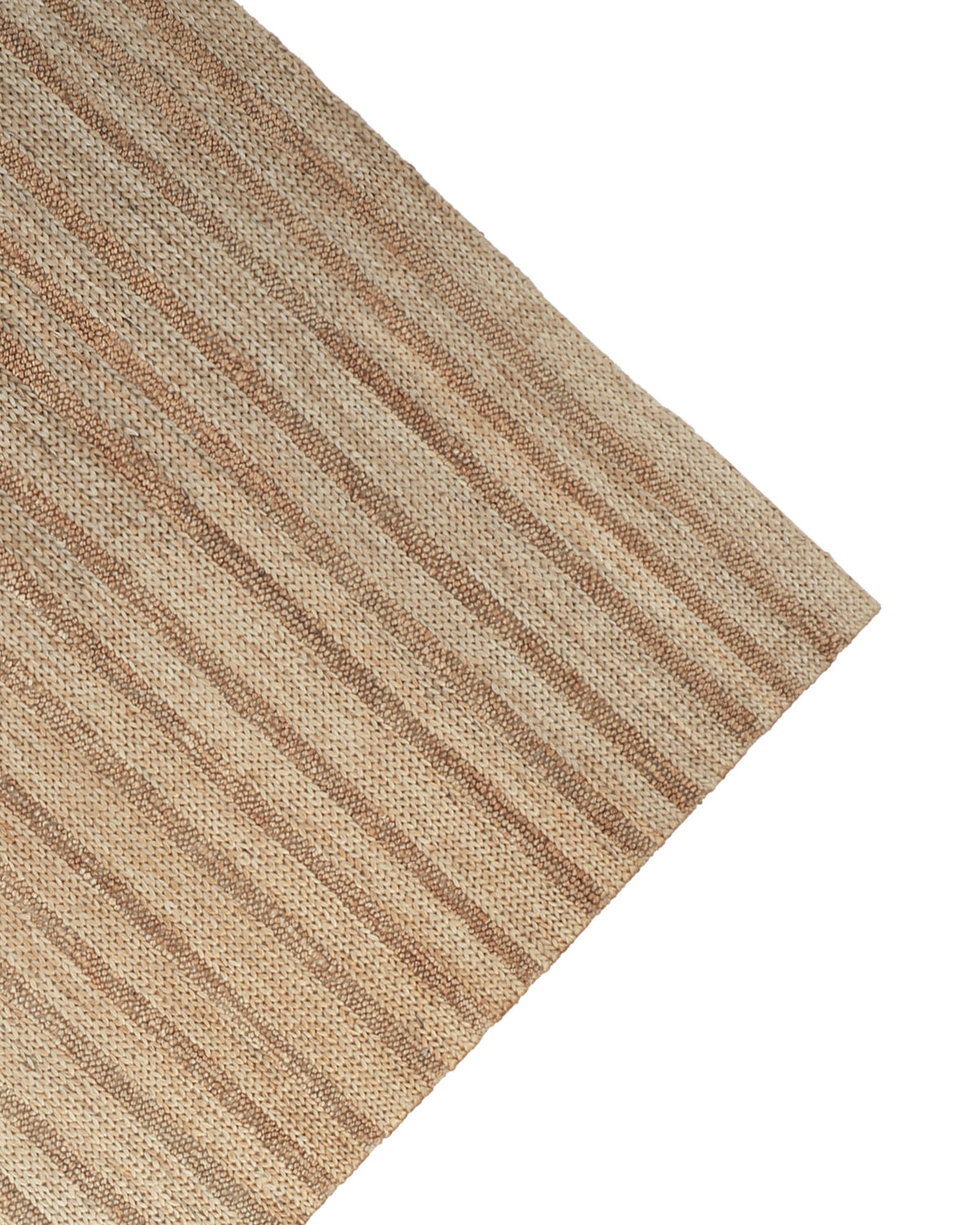 A close-up of the RAMSHA HOME Natural Color Hand Woven Jute Rug SR-043 showcases its alternating raised and flat textured stripes, displayed from an angled corner against a white background. Thoughtfully crafted by hand, this jute rug is a meaningful choice for Ramadan gifts.