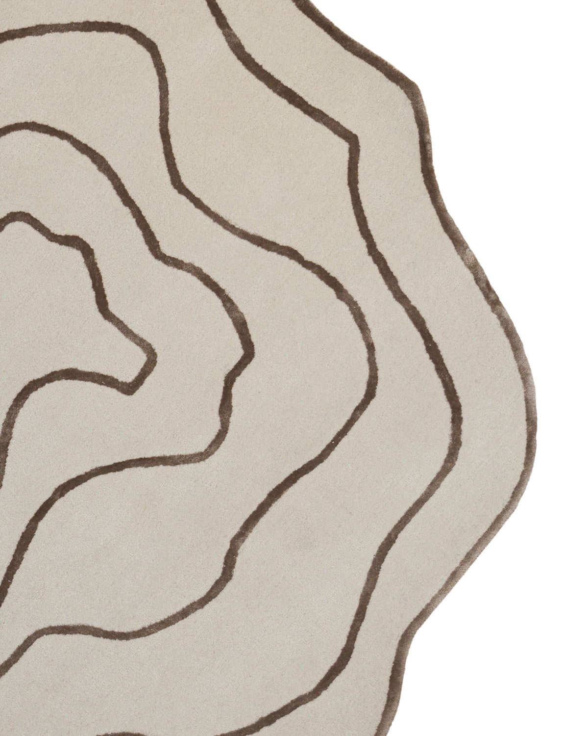 The RAMSHA HOME Handmade Multi Color Hand-Tufted Area Rug HTWV-65 features an abstract beige design with irregular brown wavy lines reminiscent of topographic map contours, displayed partially to highlight its curved edges.