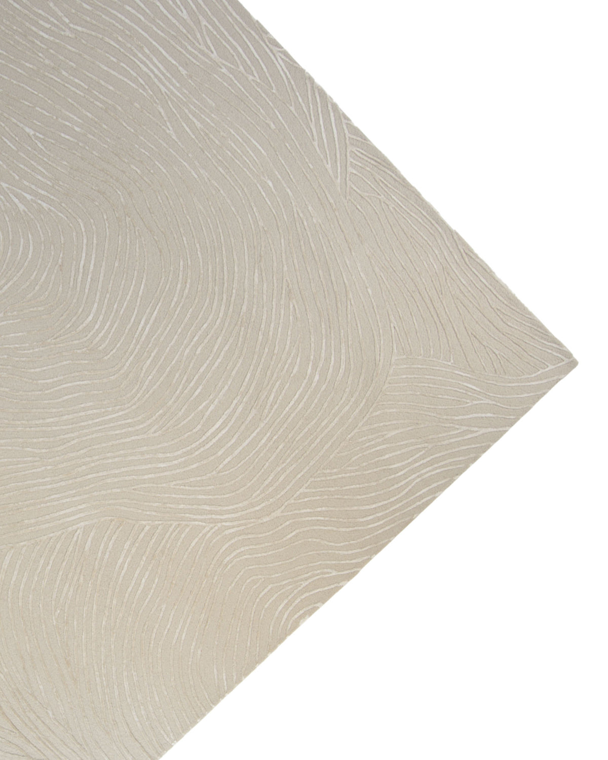 A close-up view of the RAMSHA HOME Natural White Color Handmade Area Rug (HTWV-143, 300x400 cm) reveals its textured, wavy fingerprint-like lines. The image captures an angled perspective with the top right corner of the handtufted wool rug in focus.