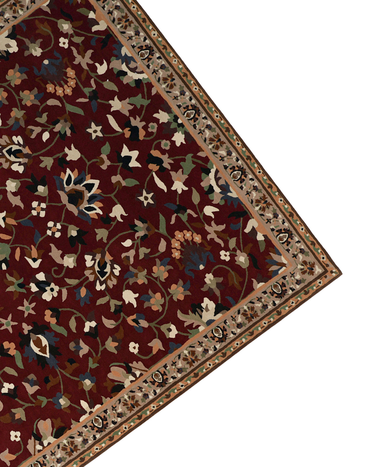 A close-up of the RAMSHA HOME Wool & Cotton Handmade Area Rug HTW-08 displays its meticulously hand-tufted corner, adorned with intricate beige, blue, and green floral and leaf motifs against a rich red background. Decorative beige and blue borders further enhance the traditional artistry and timeless detailing of this elegant area rug.
