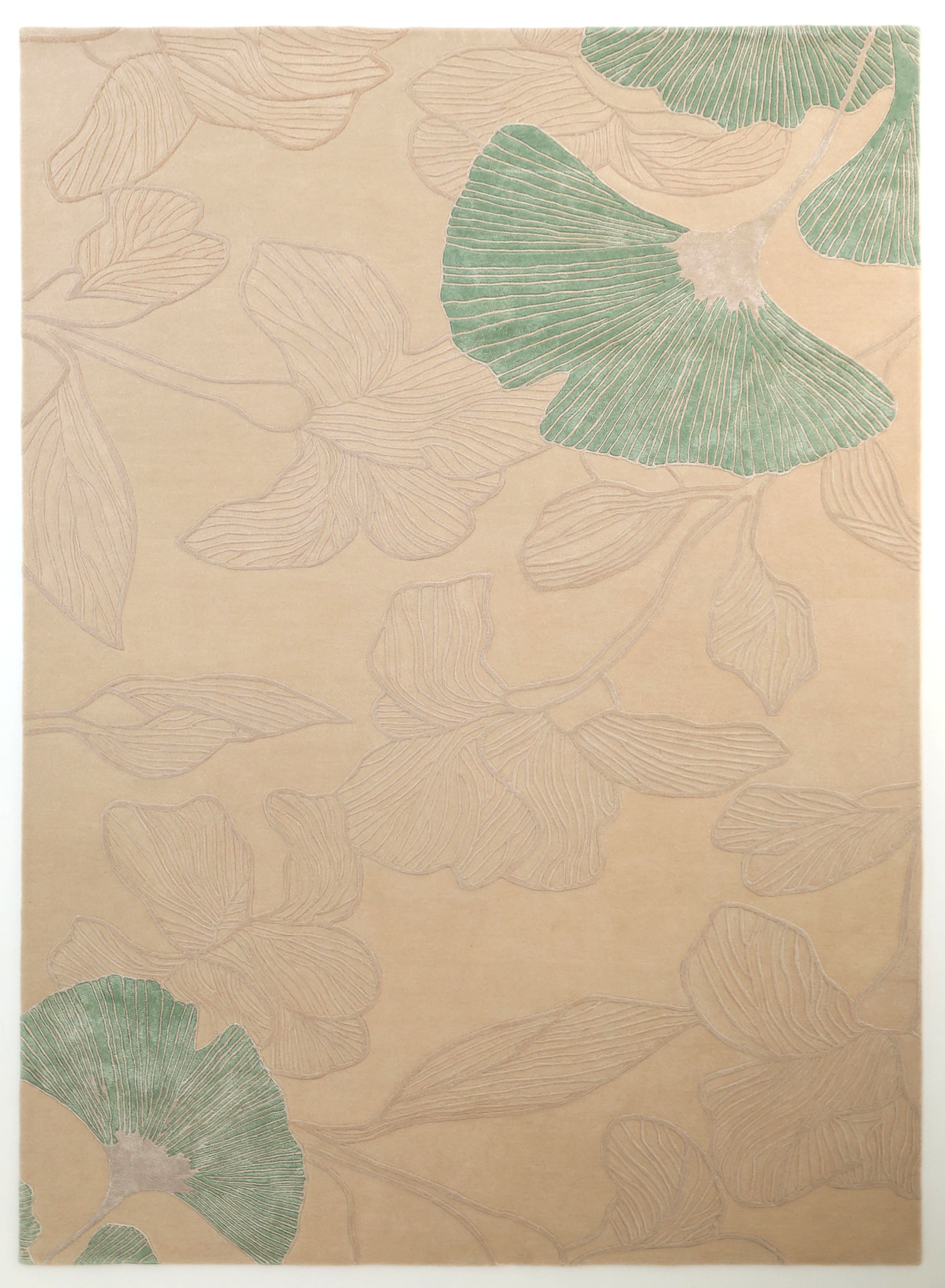The RAMSHA HOME Floral Handmade Rectangle Rug HTWV-189 features a beige background with subtle botanical patterns and faint floral outlines, including two green leaves, for a delicately textured artisanal look.