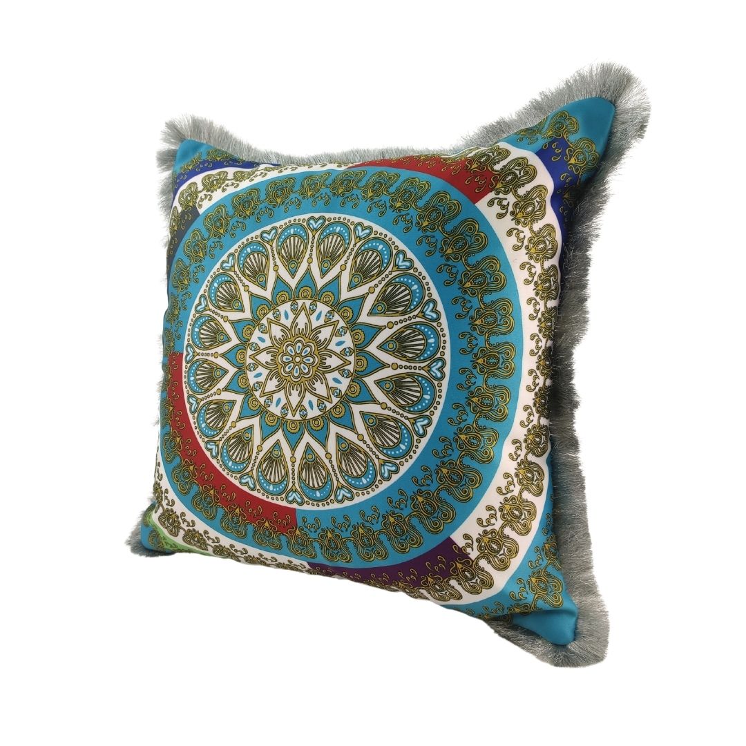 The RAMSHA HOME Polyester Multi Cushion With Filler CS-063 features an ornate mandala design in blue, gold, red, and white with gray faux fur trim. This premium cushion includes a plush filler for enhanced comfort.