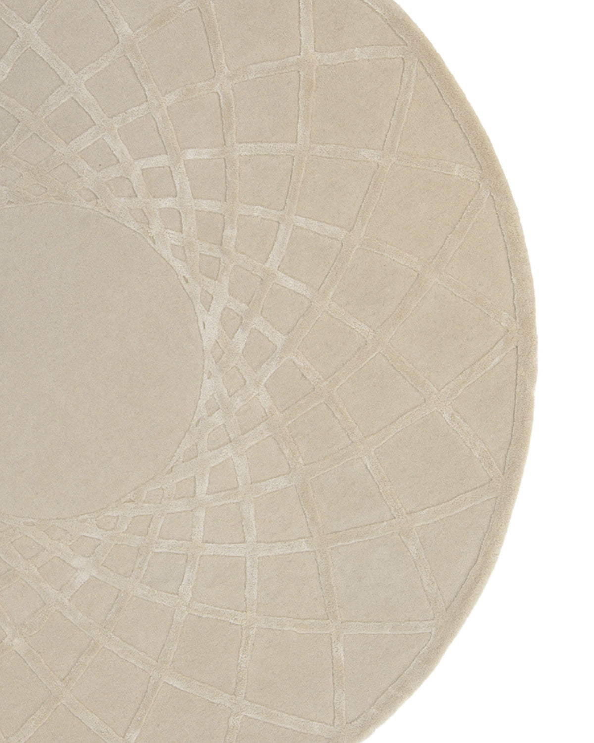 A portion of the Handmade Round Area Rug - HTWV 61 (200 Cm) by RAMSHA HOME is visible against a white background, showcasing its round, beige hand-tufted design with a geometric crisscross pattern.