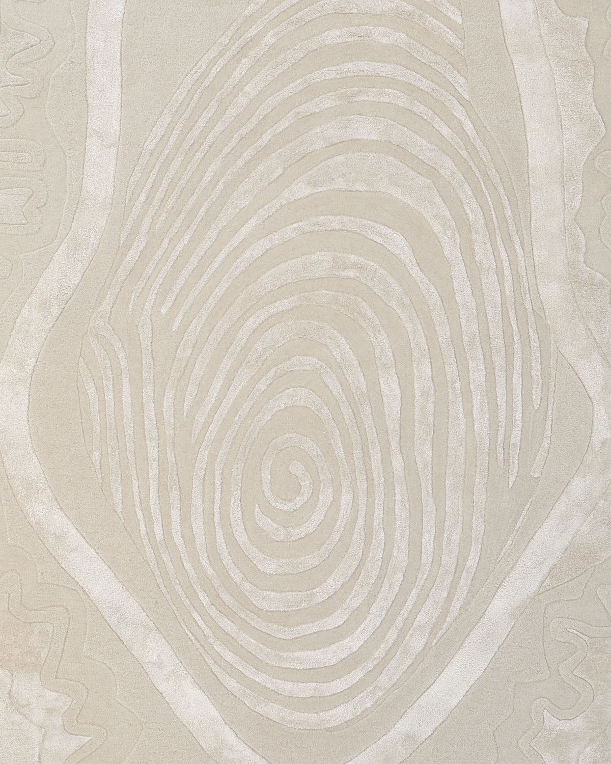 Here’s a revised version of your sentence using the provided product data: The Abstract Beige Handcrafted Rug – Neutral Textured Modern Area Rug (HTWV 204) by RAMSHA HOME features a central spiral, fingerprint-like pattern in shades of beige and cream, surrounded by wavy abstract contours—creating a versatile neutral rug that effortlessly complements any modern space.