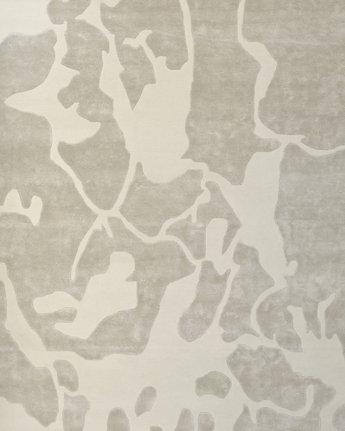 Introducing the RAMSHA HOME Multi Color Handmade Area Rug - HTWV-132, featuring an abstract pattern with irregular, organic shapes in light beige and gray shades that evoke a camouflage or topographic map design. This luxurious handtufted rug is expertly crafted from wool viscose, offering a soft texture for added comfort and sophisticated style.