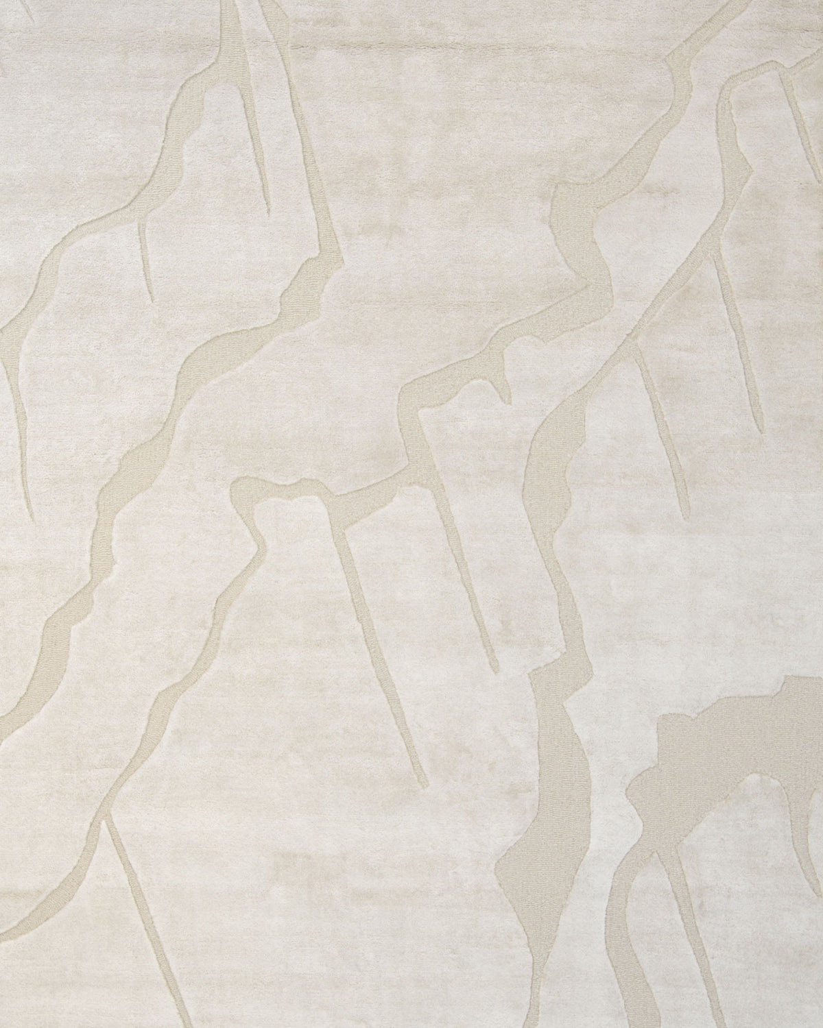 The RAMSHA HOME Modern Viscose & Wool Handmade Carpet 200x300 – HTWV-172 showcases a light beige viscose blend base adorned with abstract, irregular lines and shapes in a subtly darker tone, creating an understated, textured pattern across its surface.