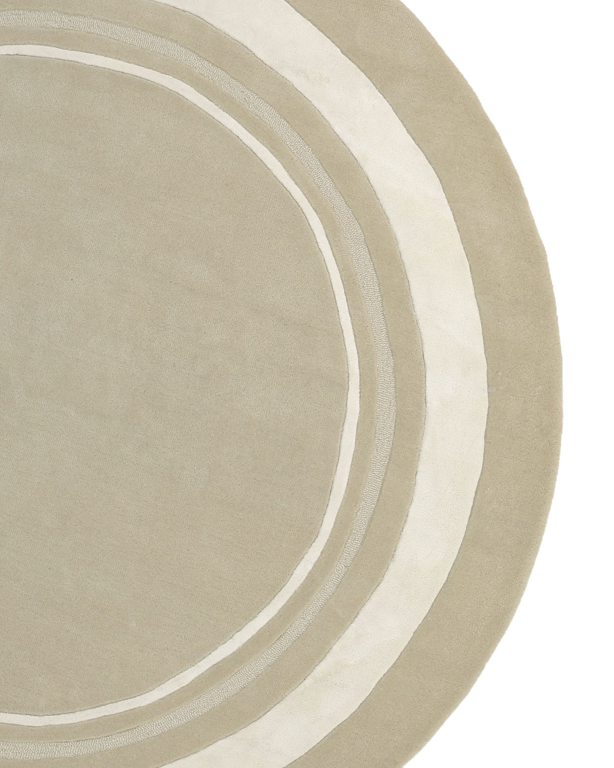 Introducing the RAMSHA HOME Multi Color Handmade Rug - HTWV-120: a modern round rug featuring concentric rings in varying shades of beige and cream, partially shown to reveal a subtle, abstract pattern.