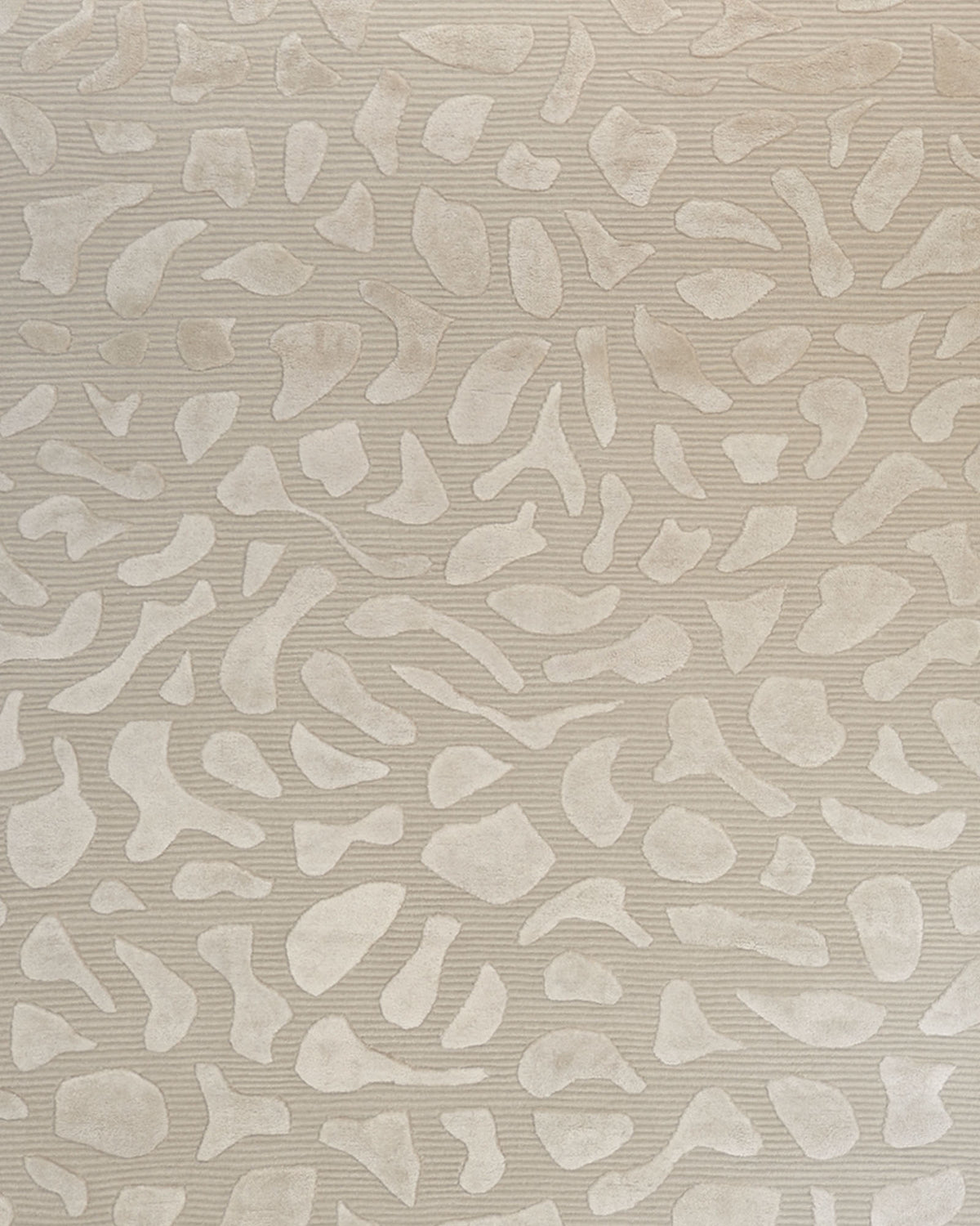 Featuring the Modern Beige Textured Rug – Abstract Organic Pattern Neutral Area Rug– HTWV 203 from RAMSHA HOME, this piece showcases an abstract, organic beige design with irregularly shaped patterns in slightly lighter shades. Its subtle and modern texture beautifully complements textured beige walls, creating a cohesive and contemporary look in any space.