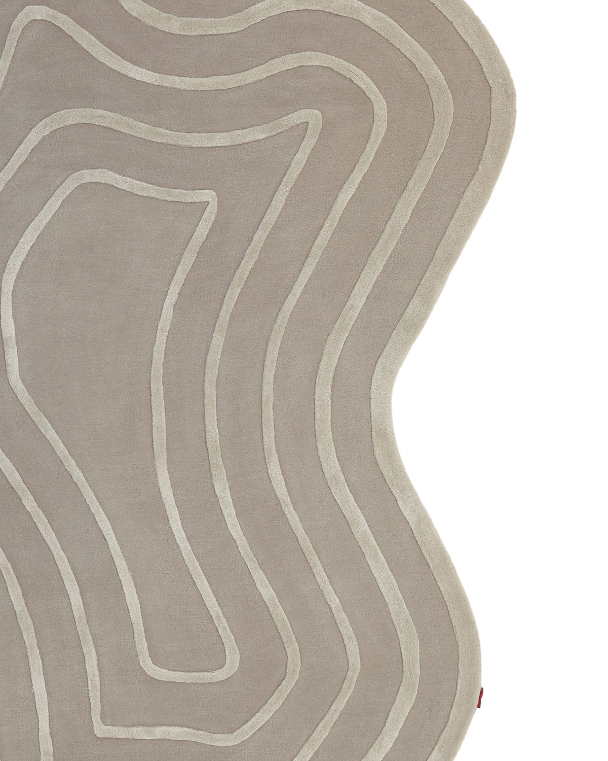 Beautiful Off White Handmade Rug - HTWV-112 (200x300cm) by RAMSHA HOME, featuring an abstract beige design with wavy, irregular light cream lines forming organic, layered shapes. The curved edge of this tencel wool blend rug contrasts against a white background. Only a portion of the rug is visible.