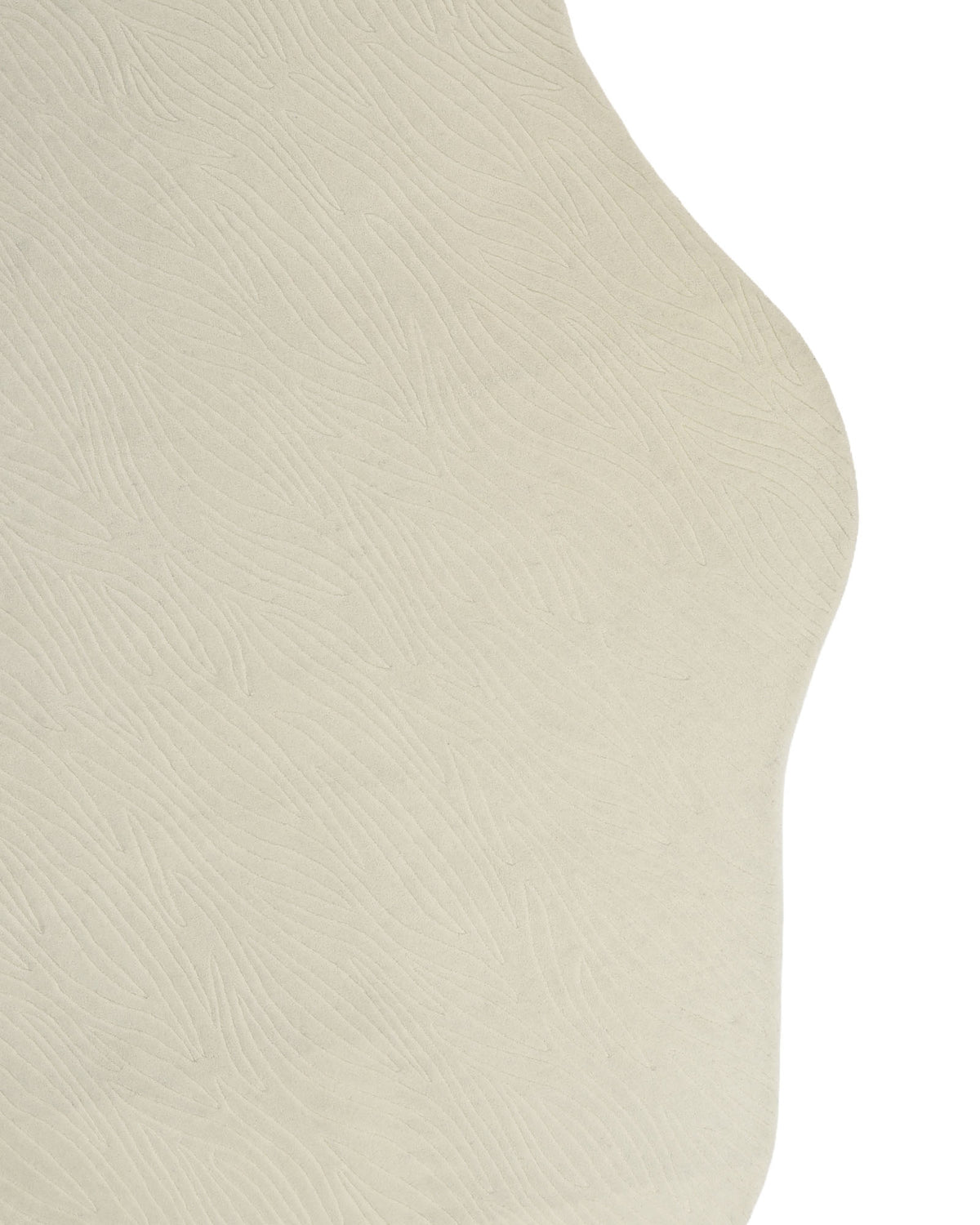 Natural White Color Area Carpet - HTW 88 by RAMSHA HOME, featuring a beige surface adorned with a subtle wavy line pattern and a gracefully curved edge on the right, reminiscent of an irregular wool rug, displayed against a plain white background.