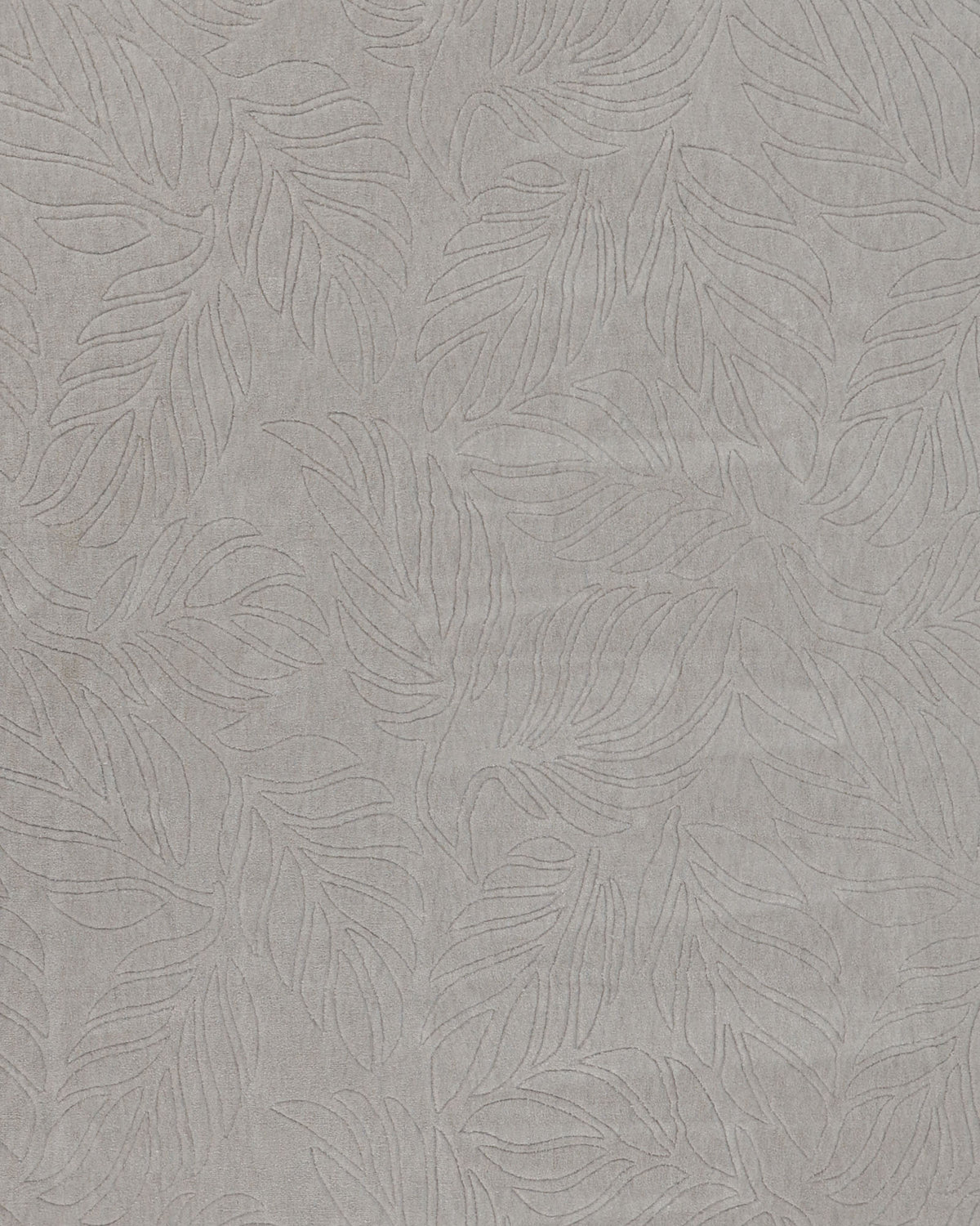The RAMSHA HOME Decorative Rectangle Handmade Grey Color 200x300 cm Area Rug (LKH-039) features a soft, light gray surface adorned with a subtle, embossed pattern of overlapping leaves, evoking the textured appearance of a loom-knotted rug.