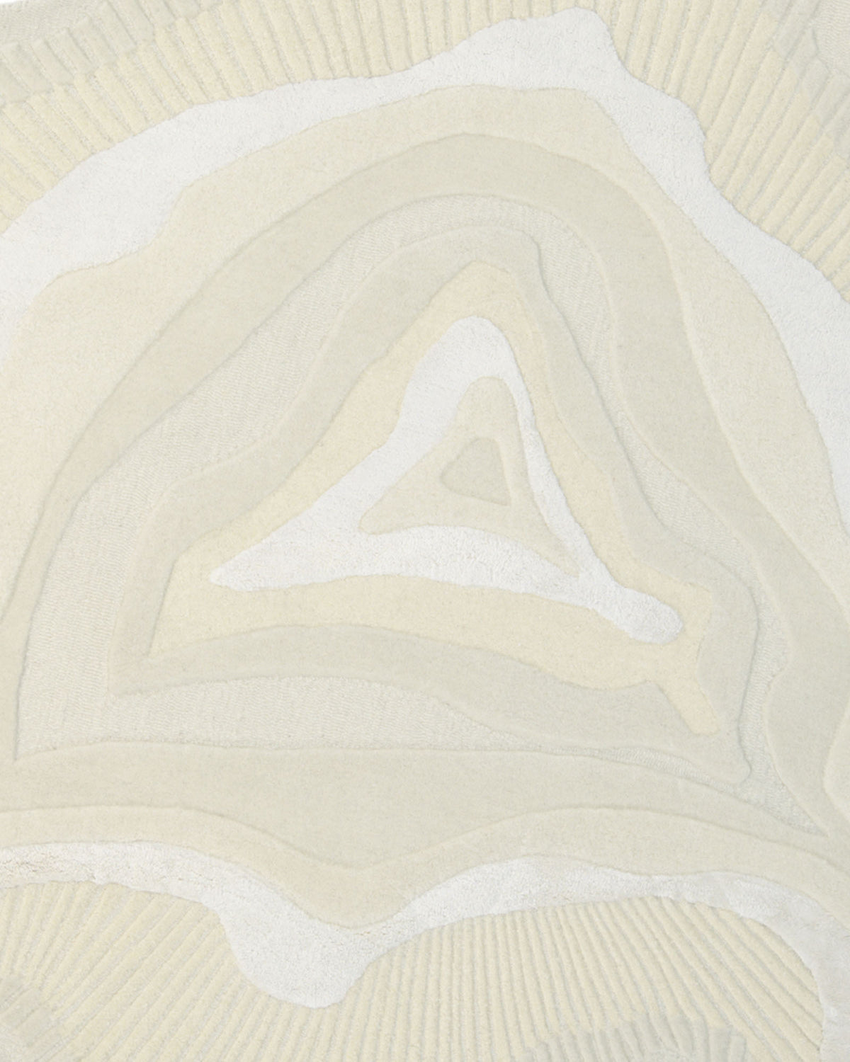 The Natural Handmade Area Rug - HTWV-126 by RAMSHA HOME features layered cream and beige shapes that form concentric, irregular triangles and ovals, reminiscent of a sculpted area rug or neutral wool blend. Its design evokes the look of a topographical map or geological formation with invitingly soft textures.