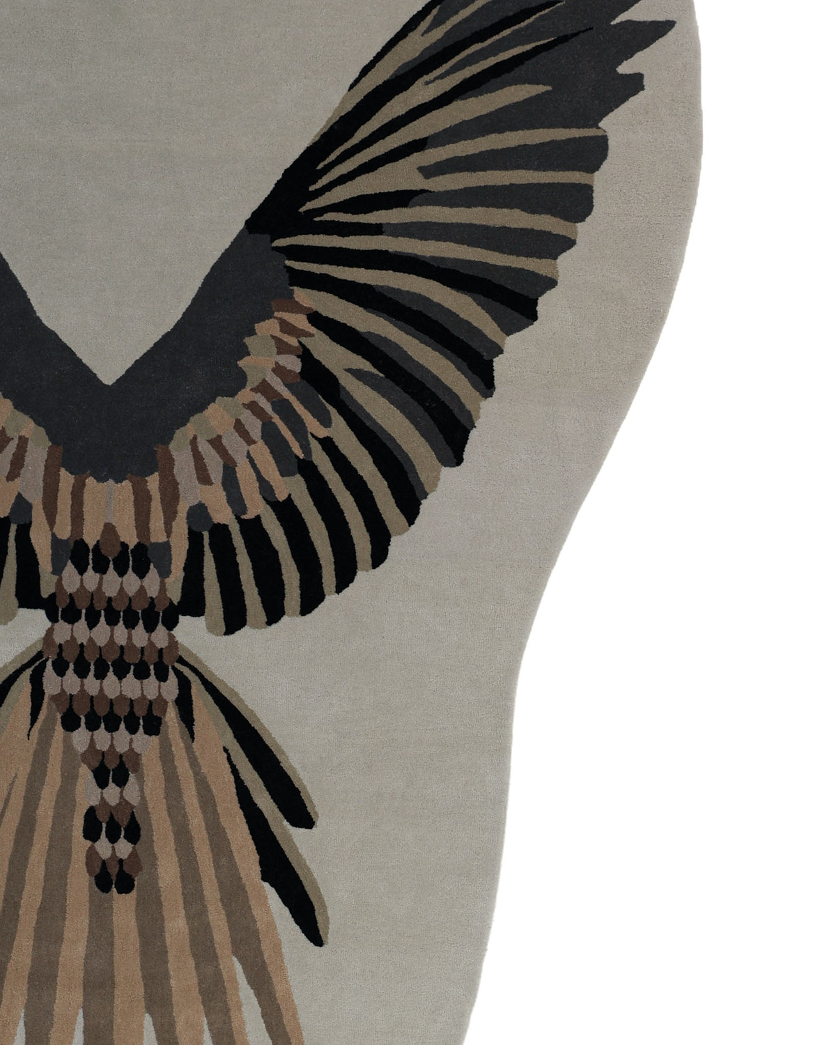 Introducing the Unshape Handmade Multi Color Rug HTW-82 by RAMSHA HOME—a unique hand-tufted wool rug featuring a striking, stylized bird with outstretched wings in black, brown, and beige tones. Set against a light gray, irregularly shaped backdrop, this artistic piece adds a touch of flair and sophistication to any room.
