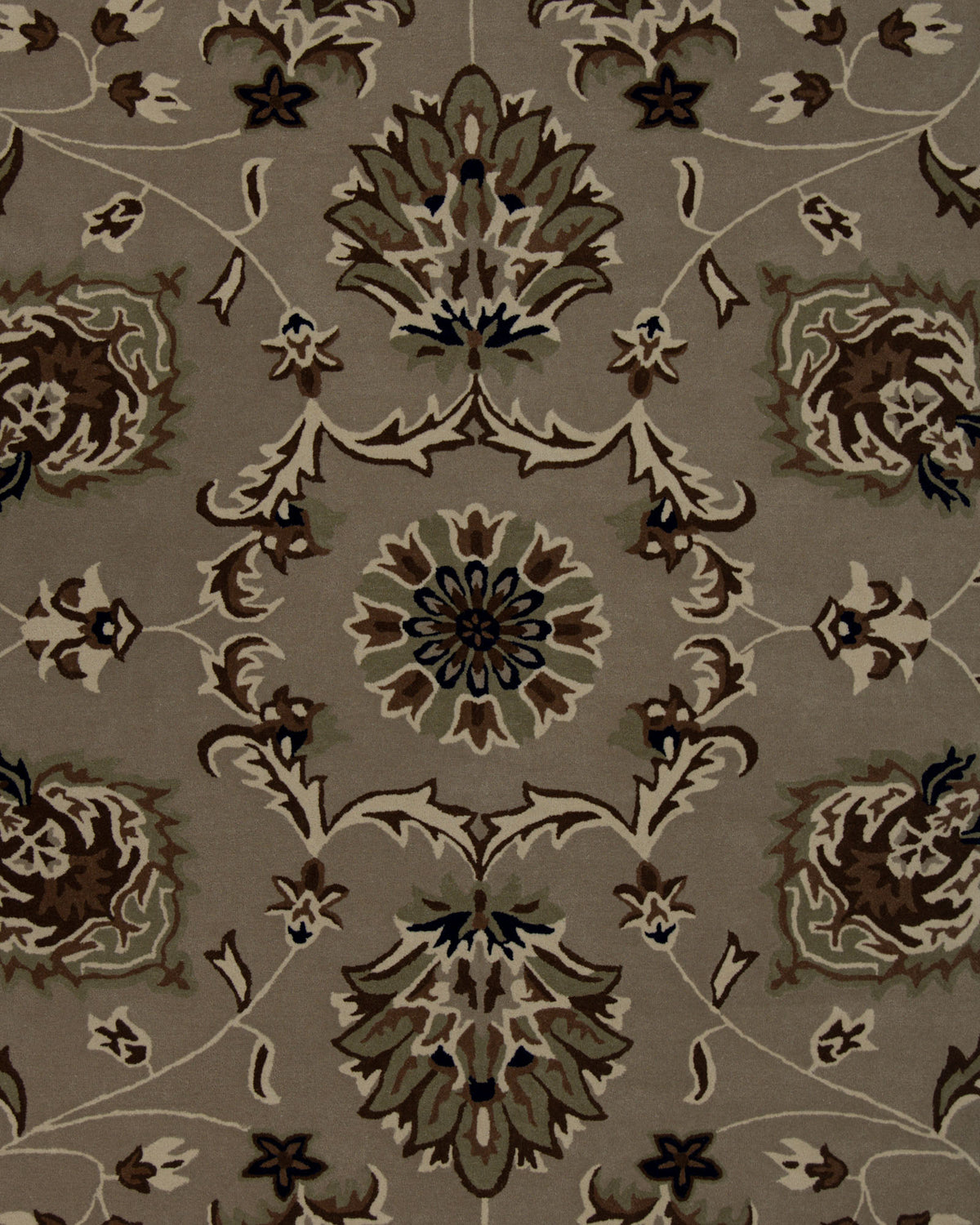 The Exquisite Multi Color Handmade Rug - HTW 09 (200x300 cm) by RAMSHA HOME showcases symmetrical floral and leaf motifs in brown, beige, green, and dark blue on a taupe background for a traditional patterned look.