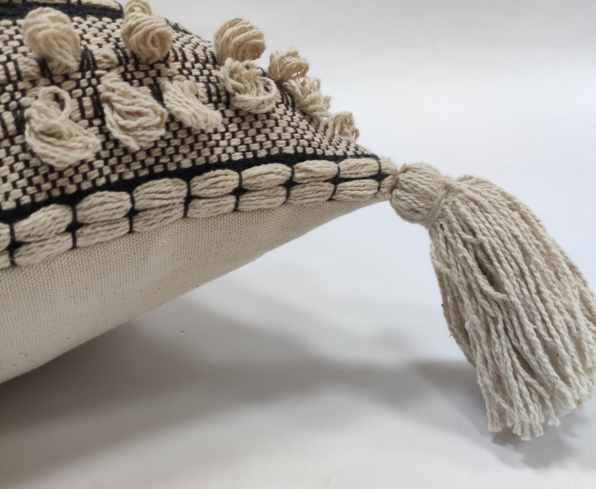 Unique Tassel Design: Elevate your decor with the eye-catching tassel design, adding a playful and stylish accent to your living space.