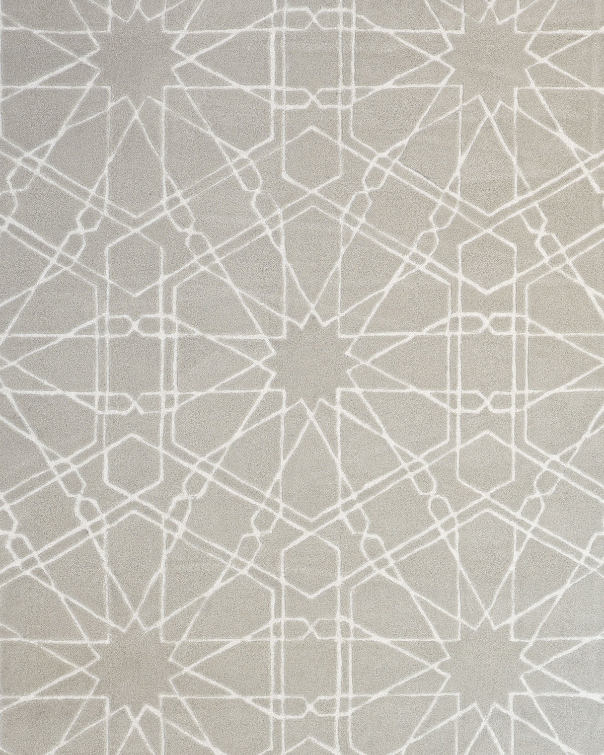 The RAMSHA HOME Decorative Rectangle Shape Rug HTP-15 features a light gray surface adorned with a white pattern of intersecting lines and star shapes in a symmetrical, repeating design. Hand tufted for comfort, this rug blends contemporary style with modern appeal, making it an ideal addition to any room.