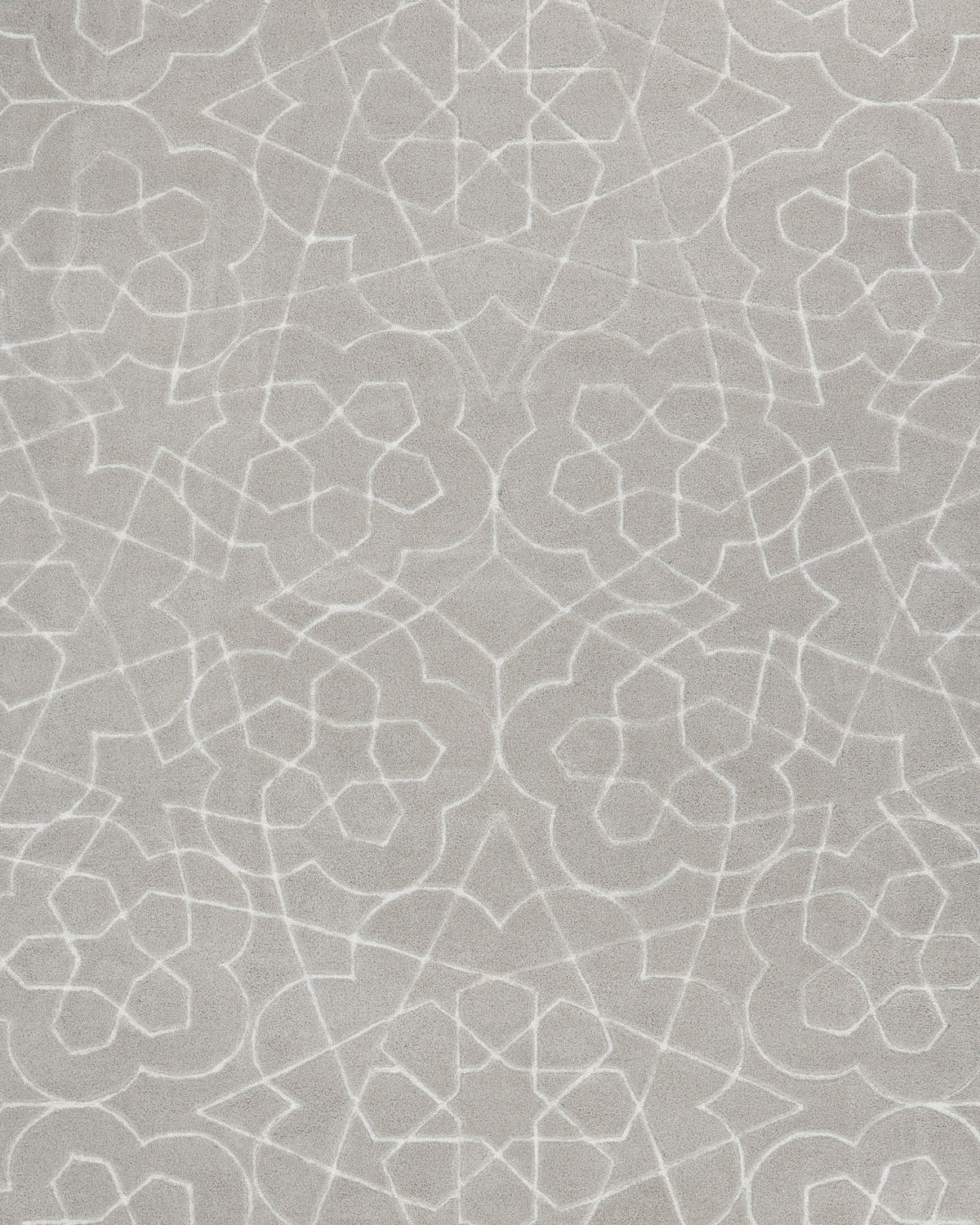 Introducing the Home Decor Area Rug HTP-17 by RAMSHA HOME—a hand-tufted rectangular rug featuring a gray surface adorned with an intricate white geometric pattern of interlocking shapes and symmetrical lines, inspired by traditional Islamic art and classic tile designs. This striking transitional floor covering effortlessly blends timeless elegance with modern style, making it a perfect addition to any space.