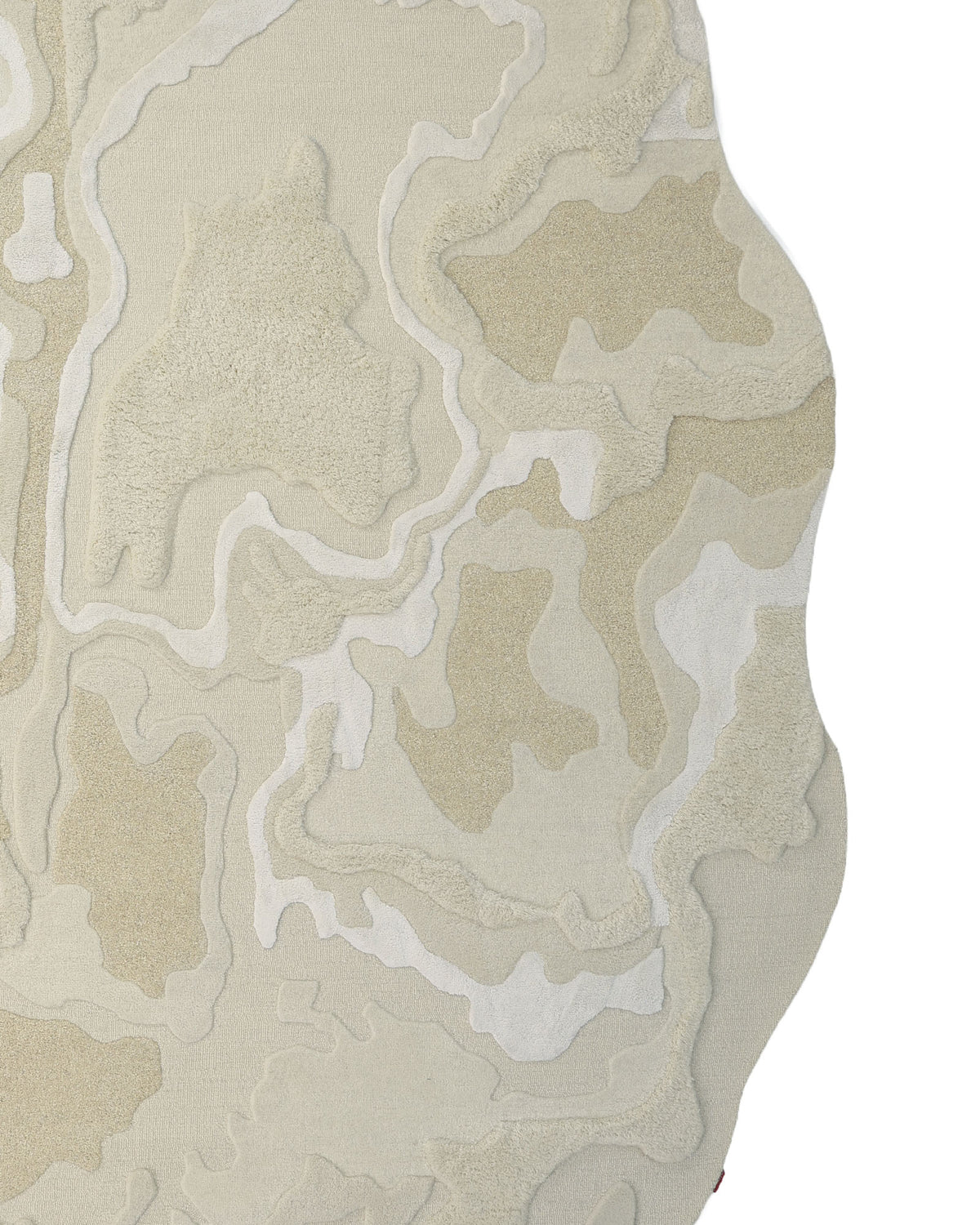 The RAMSHA HOME Handcrafted Natural White Area Rug – HTWV-129 features an abstract design with layered, wavy shapes in cream, beige, and light brown tones. Expertly handtufted, this modern rug showcases an irregular edge for a textured and organic look on a pristine white background.