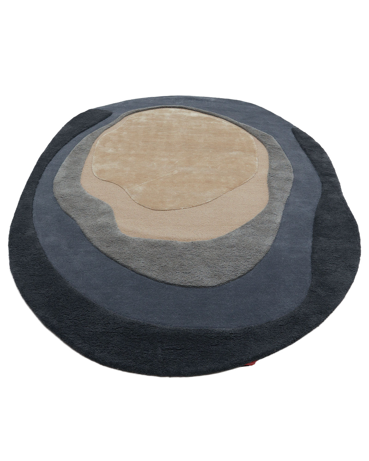 The RAMSHA HOME Oval Shape Home Decor Multi Color Rug HTWV-90 features layered, irregular rings in beige, gray, and dark blue that evoke the look of a topographical map. This modern wool area rug is expertly hand tufted to add both texture and style to your space.