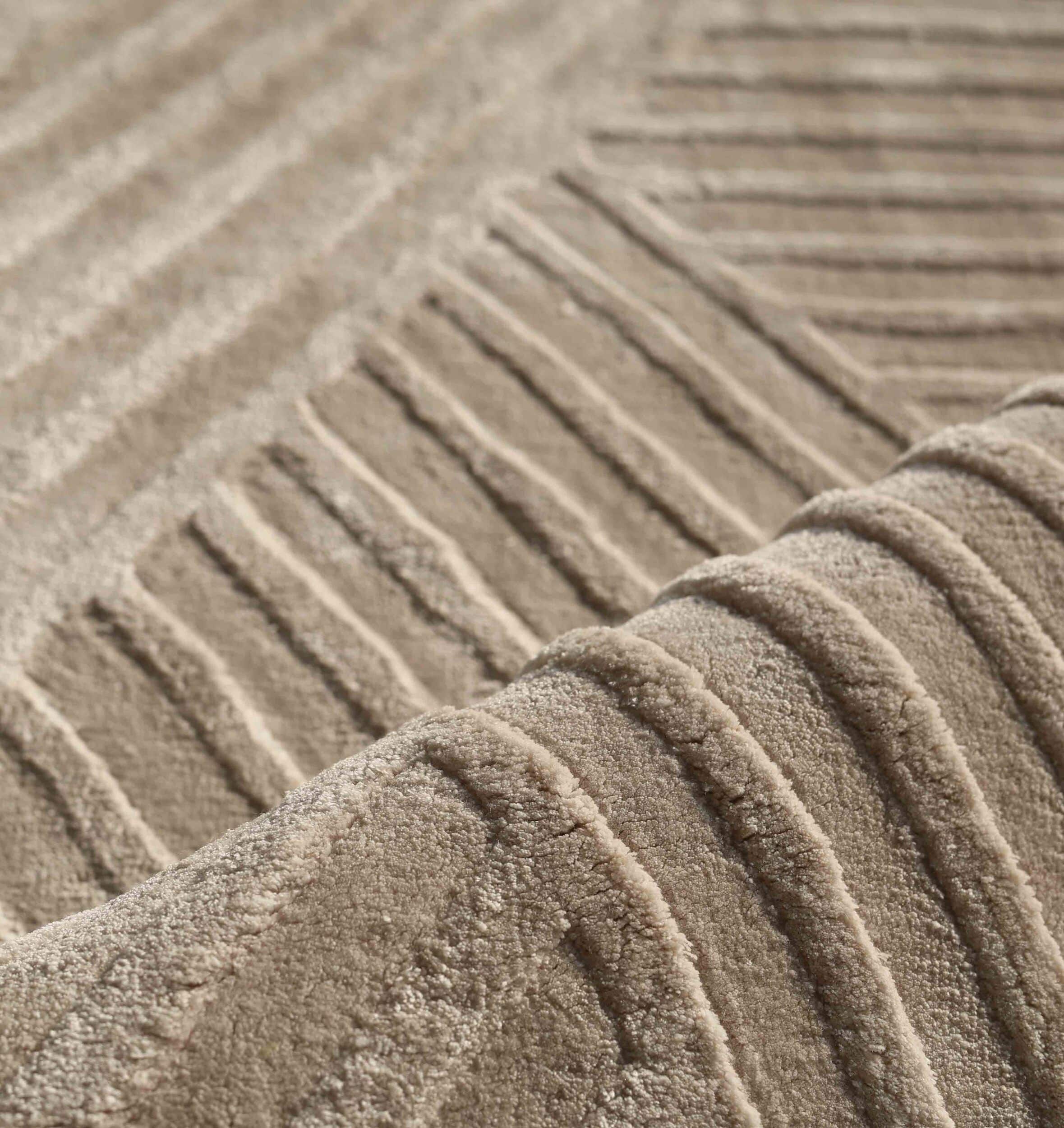 Close-up of the RAMSHA HOME Textured Geometric Home Decor Handmade Area Rug (LKH-06), featuring raised parallel lines and plush fibers for a soft, tactile feel—ideal for adding subtle texture and geometric style to your space.