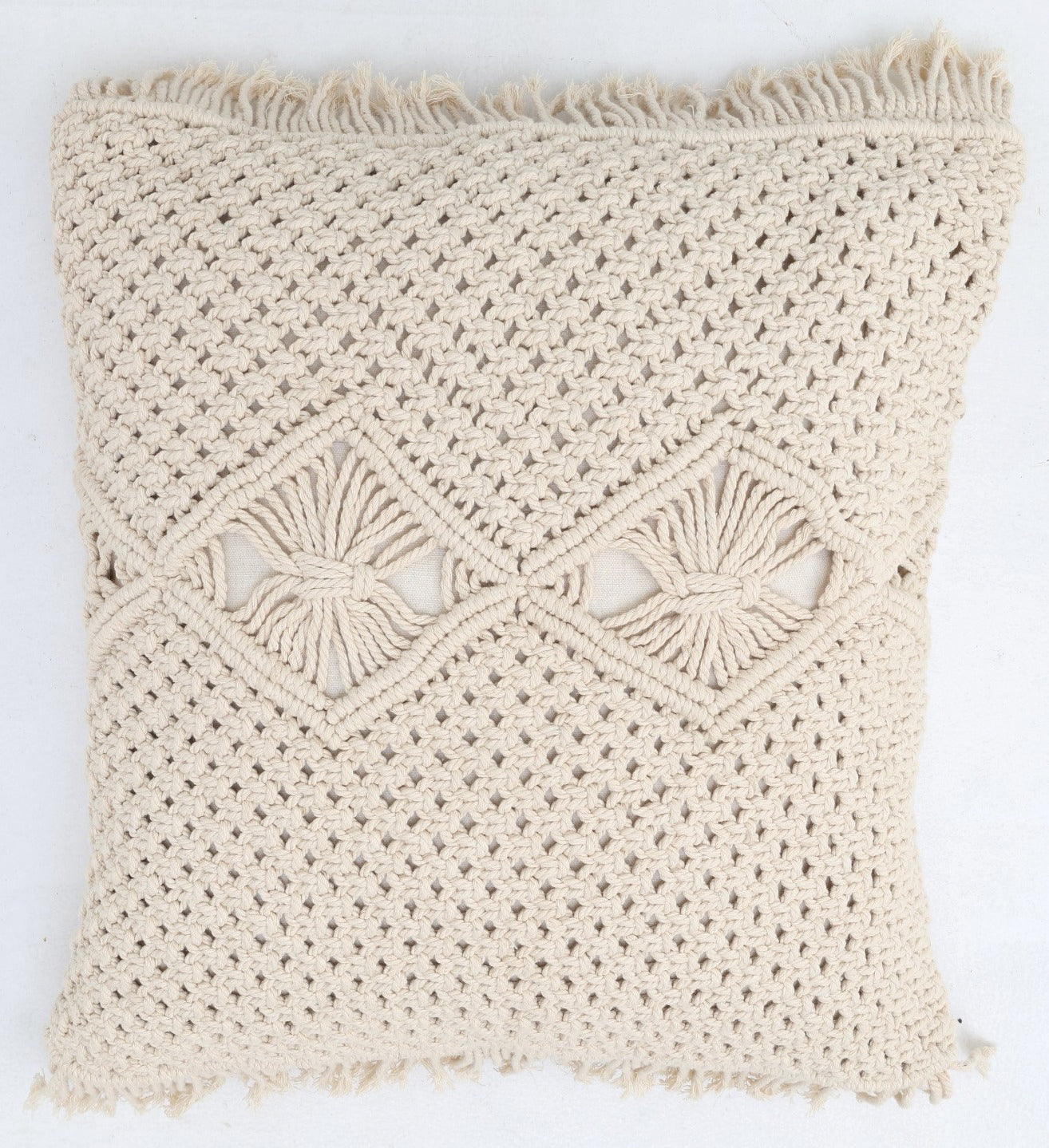 The Ramsha Home Natural White Macrame Cushion - CS 311 features a square, handcrafted design with a textured knit, fringed edges, and two woven diamond patterns for an artisanal and cozy look.