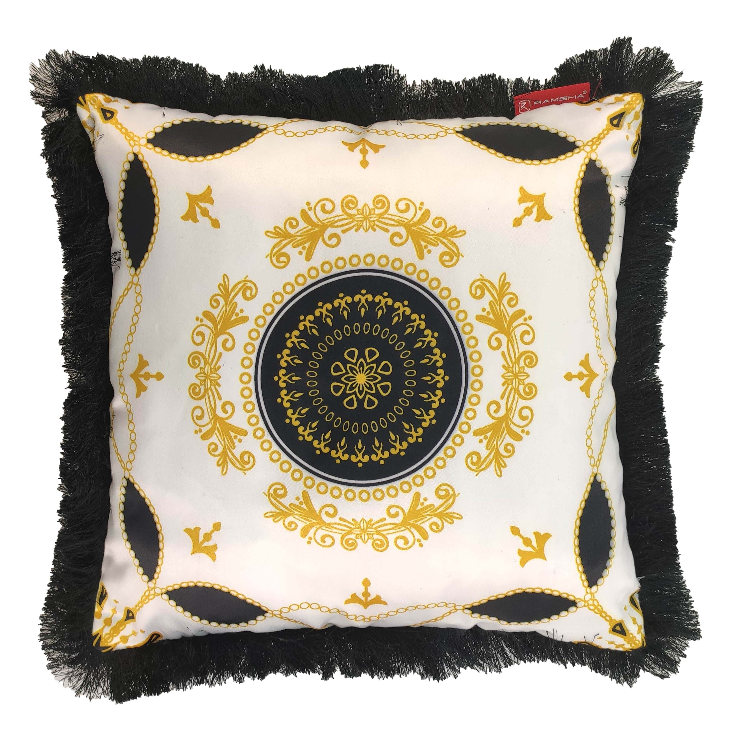 The RAMSHA HOME Cushion With Filler Multi Color CS-055 features a white base, gold and black ornate circles, black fringe edges, and a red fabric tag. Crafted from polyester, it adds elegant style to any room.